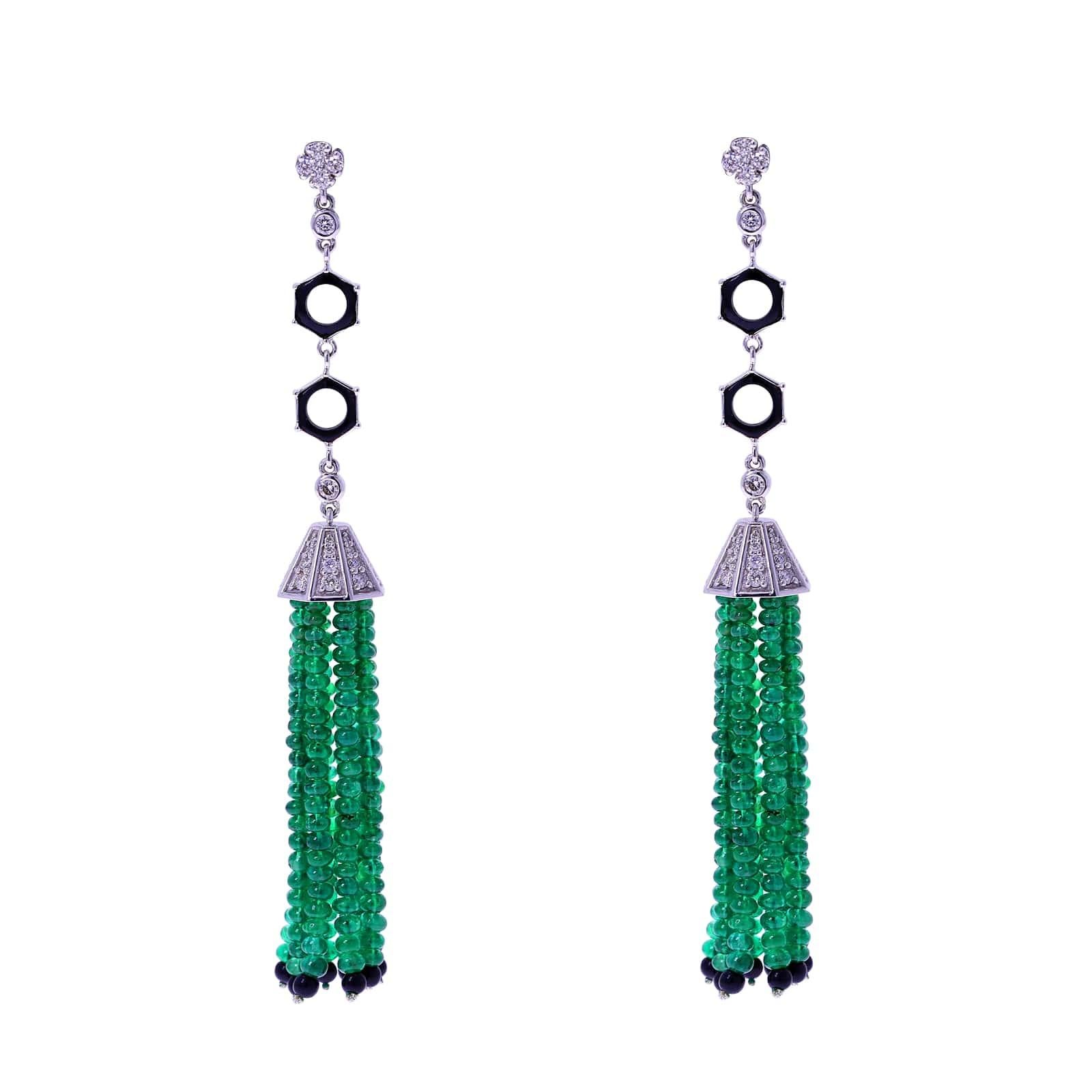 A beautiful work of art with Emerald Bead Tassels with Diamonds and Onyx. There are 44.16 cts. of Emeralds, 3.93 cts. of Onyx, and 1.50 cts. of Diamonds. The earrings weighs 20.20 grams.