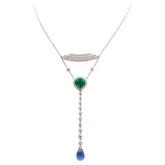 Emerald, Blue Sapphire and Diamond in 18 Karat White Gold Settings