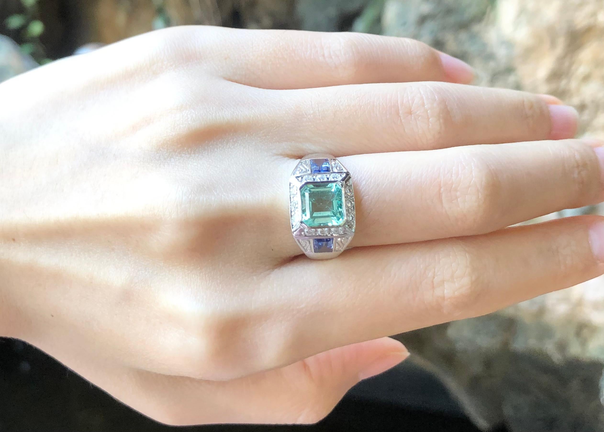 Emerald 1.79 carats , Blue Sapphire 0.92 carat and Diamond 0.35 carat Ring set in 18 Karat White Gold Settings

Width:  0.8 cm 
Length: 0.8 cm
Ring Size: 55
Total Weight: 5.7 grams


