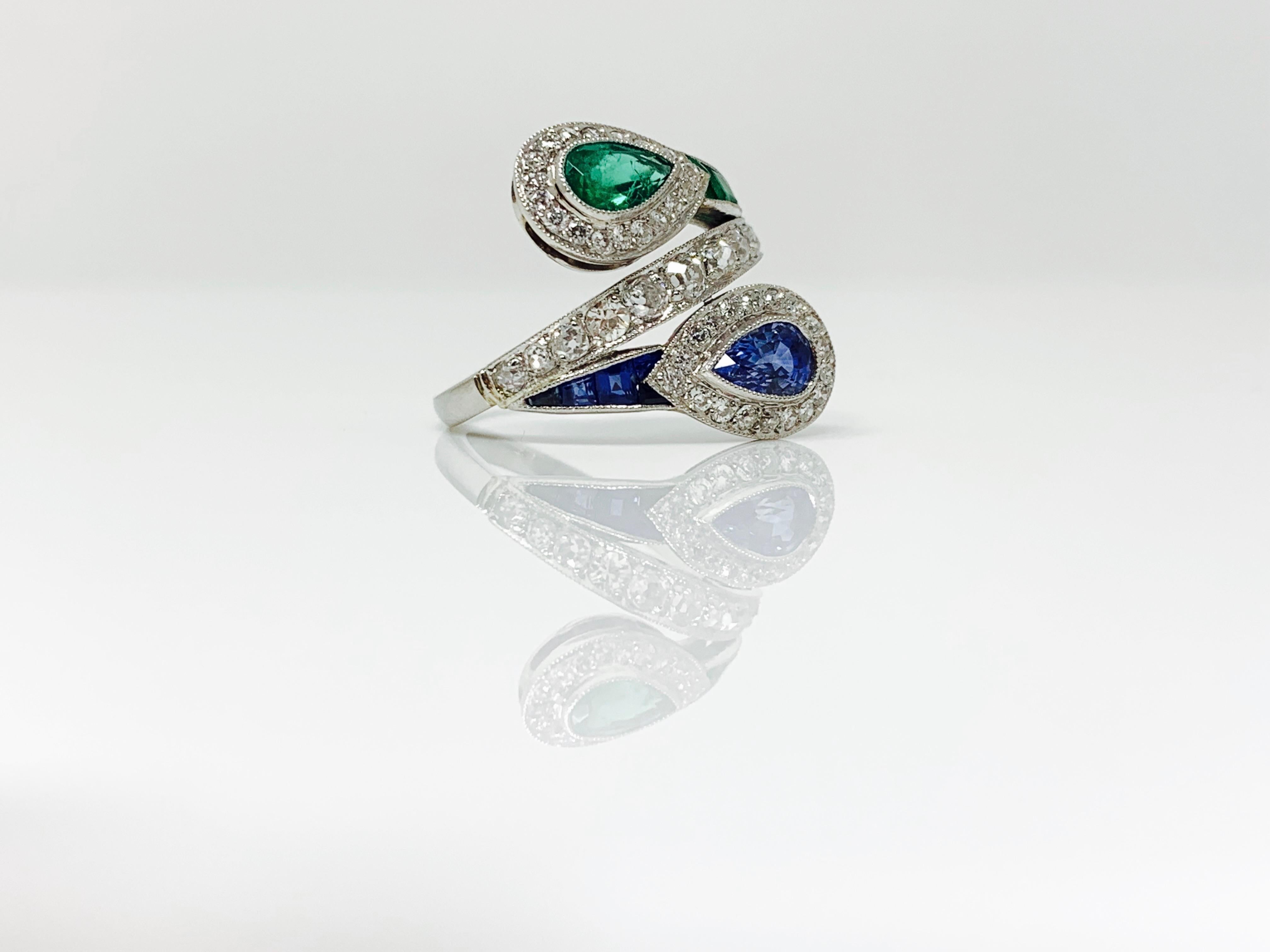 Round Cut Emerald, Blue Sapphire and White Diamond Twin Ring in Platinum For Sale