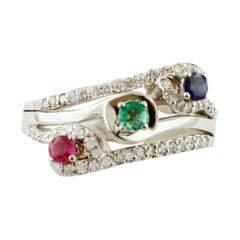 Emerald, Blue Sapphire, Ruby, Diamonds, 18 Karat Gold Modern Three Stones Ring