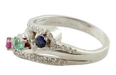 Emerald, Blue Sapphire, Ruby, Diamonds, 18 Karat Gold Modern Three Stones Ring