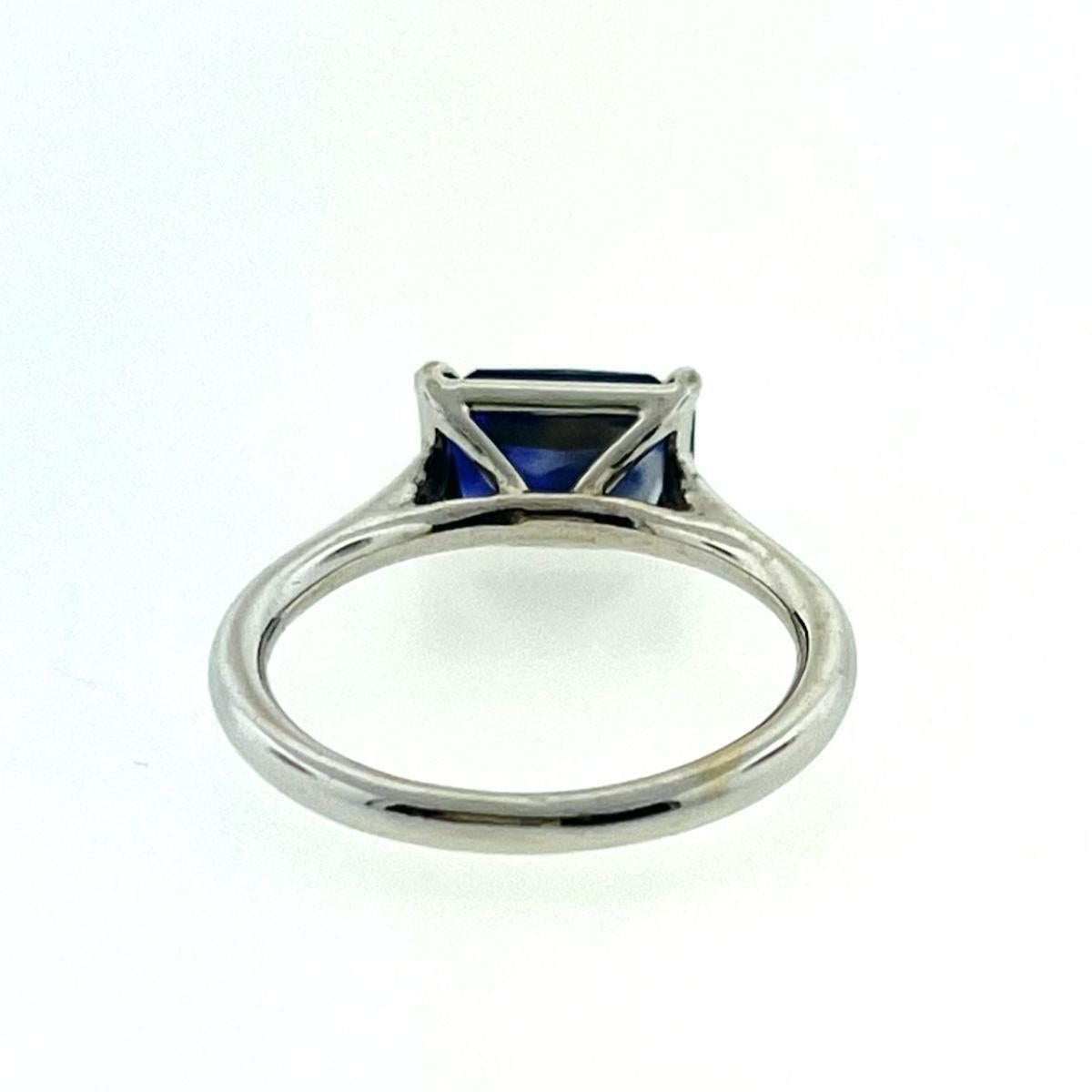 Emerald Cut Emerald Blue Sapphire Solitaire Ring For Sale