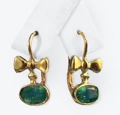 Emerald Bowtie Drop Earrings in 18 Karat Yellow Gold