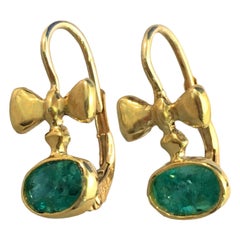Emerald Bowtie Drop Earrings in 18 Karat Yellow Gold