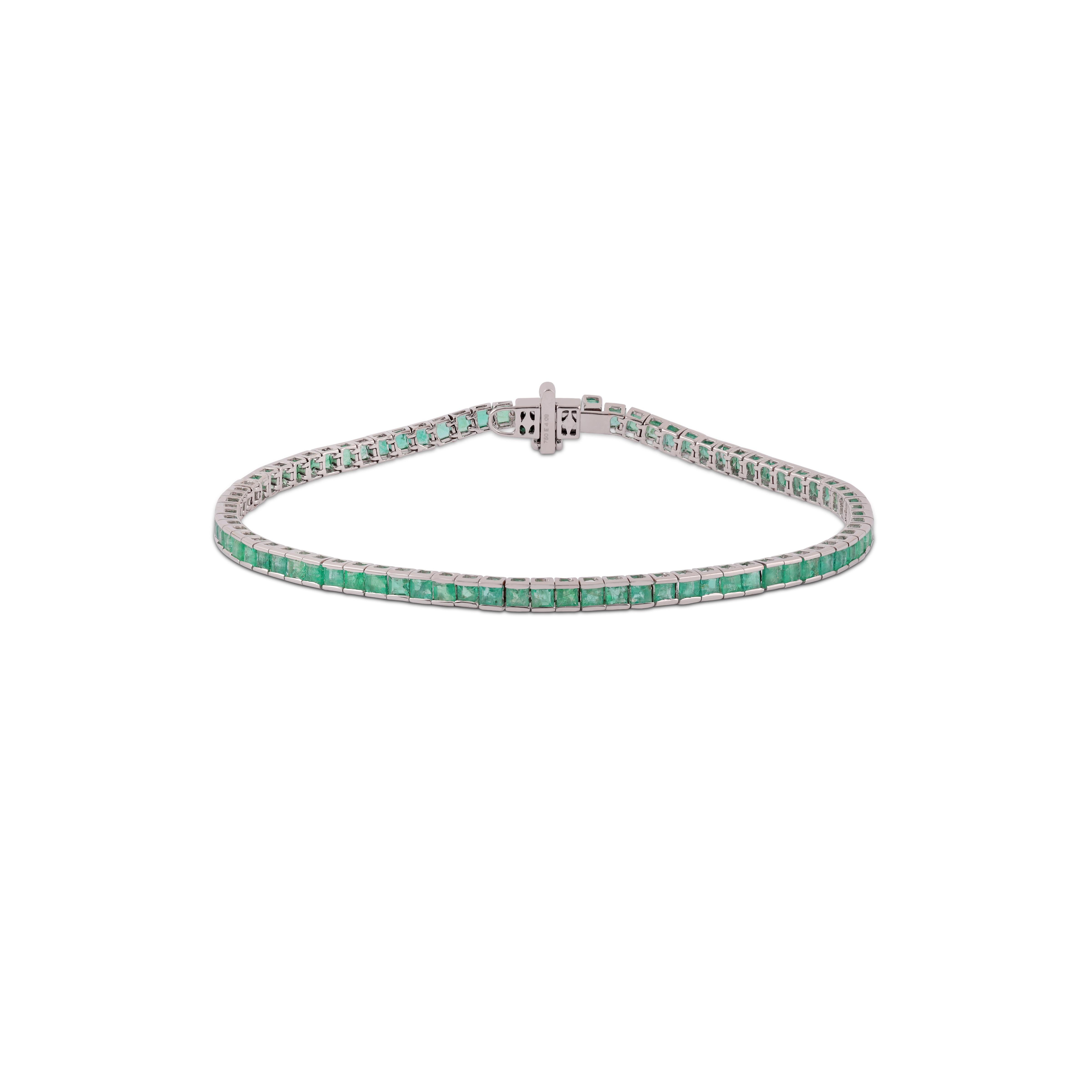 This is an elegant Emerald  bracelet features 81 pieces of princess cut Emerald 4.09 carat in the channel setting, this bracelet entirely made in 18 karat White gold weight 6.42 grams, this is a classic tennis bracelet.