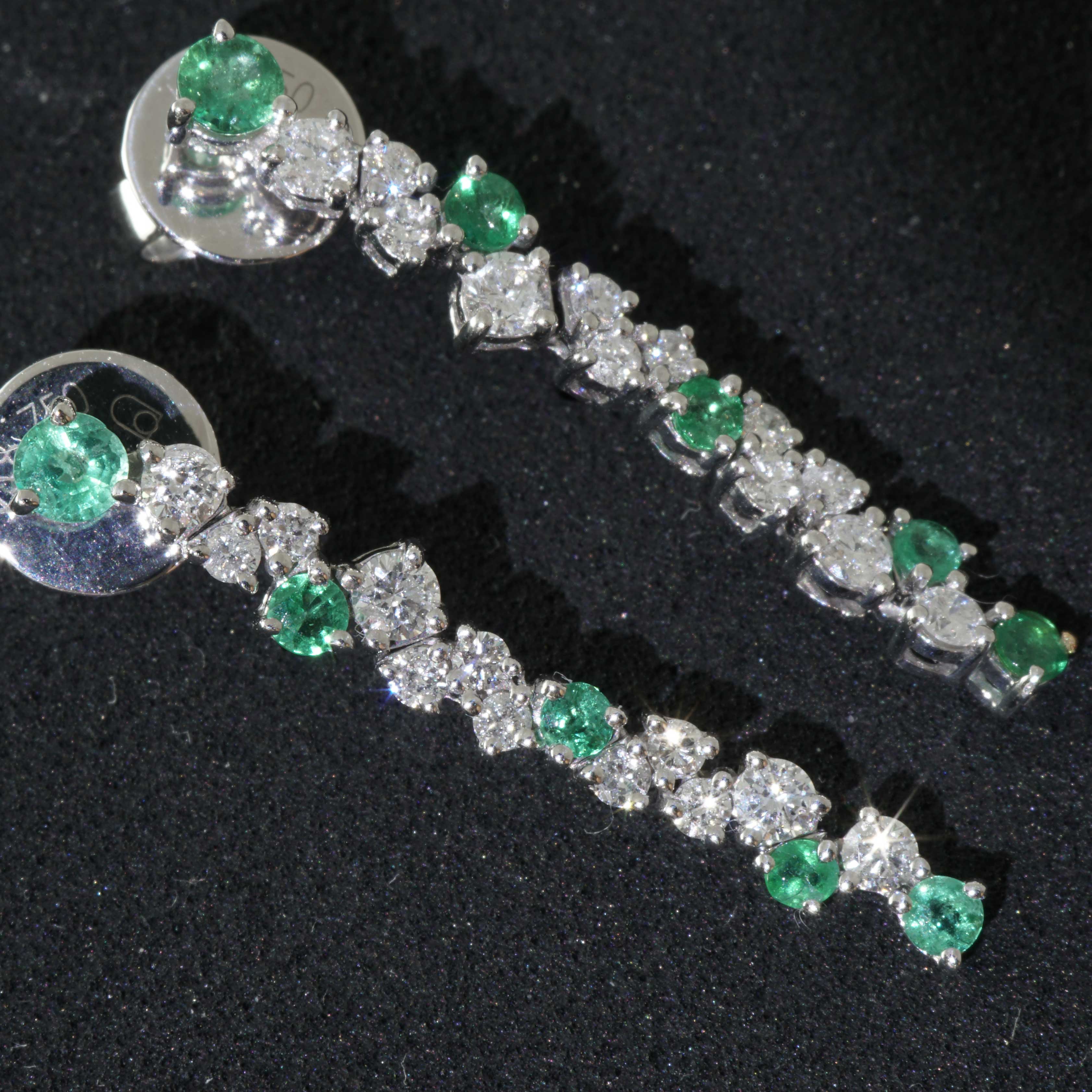 Modern Emerald Brilliant Earrings for a glorious Appearance 0.40 ct 0.56 ct 27 x 4 mm For Sale