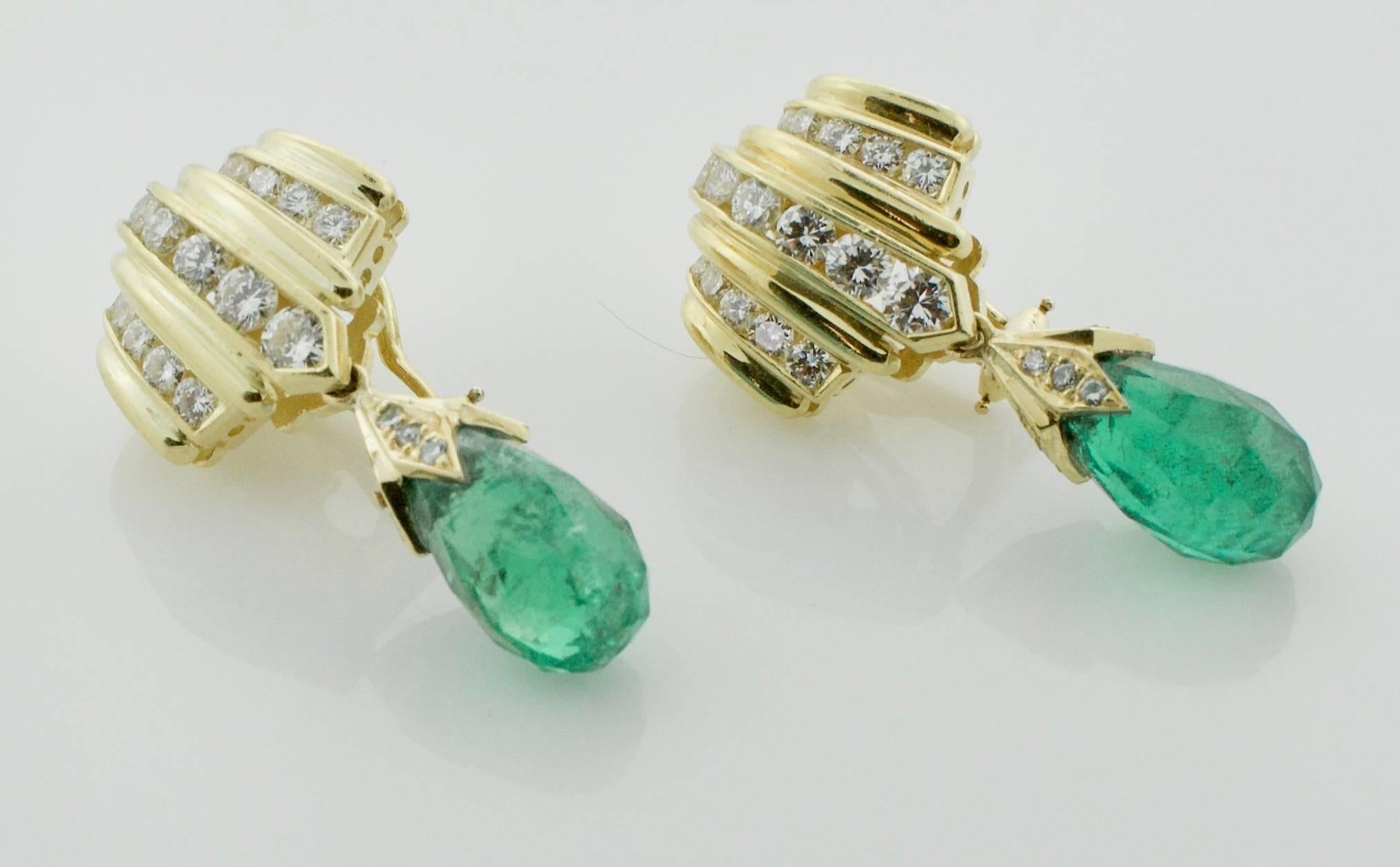 Emerald Briolette and Diamond Earrings in 18k Yellow Gold 
Two Briolette Cut Emeralds weighing 13.25 carats [great color slightly included]
Sixty Two Round Brilliant Cut Diamonds weighing 2.17 carats [GH VVS-VS2]
Clip Backs with no posts.  We will