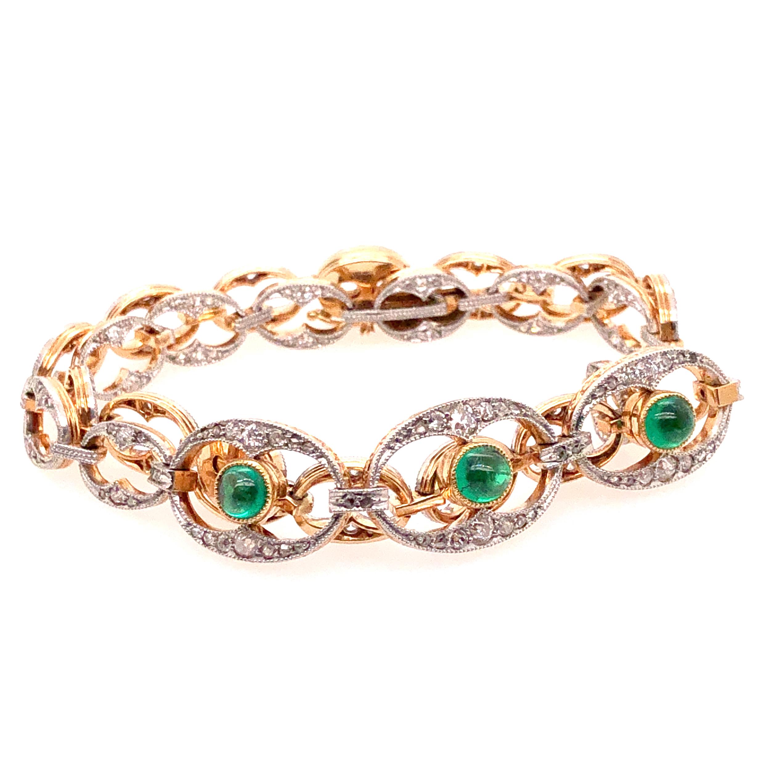 A very fine and intricate Belle Epoque collier de chien, which can also be worn as a bracelet. It has three beautiful emerald cabochons in the centre that are surrounded by old European cut diamonds. Each panel is studded with diamonds. The gold is