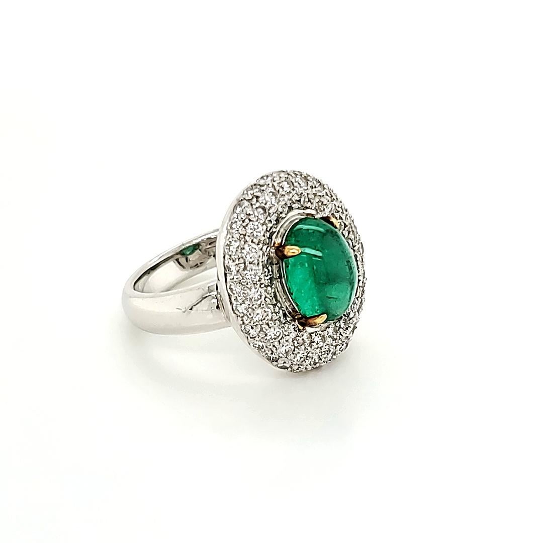 Contemporary Emerald Cabochon and Diamond Halo Ring