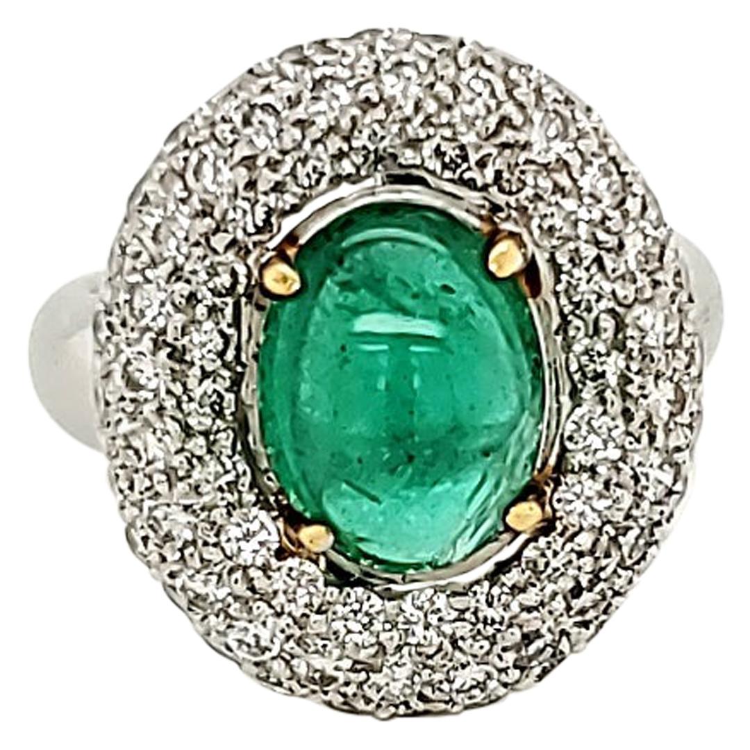 Emerald Cabochon and Diamond Halo Ring