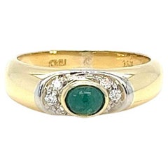 Stapelring aus Gelbgold mit Smaragd-Cabochon und Diamant