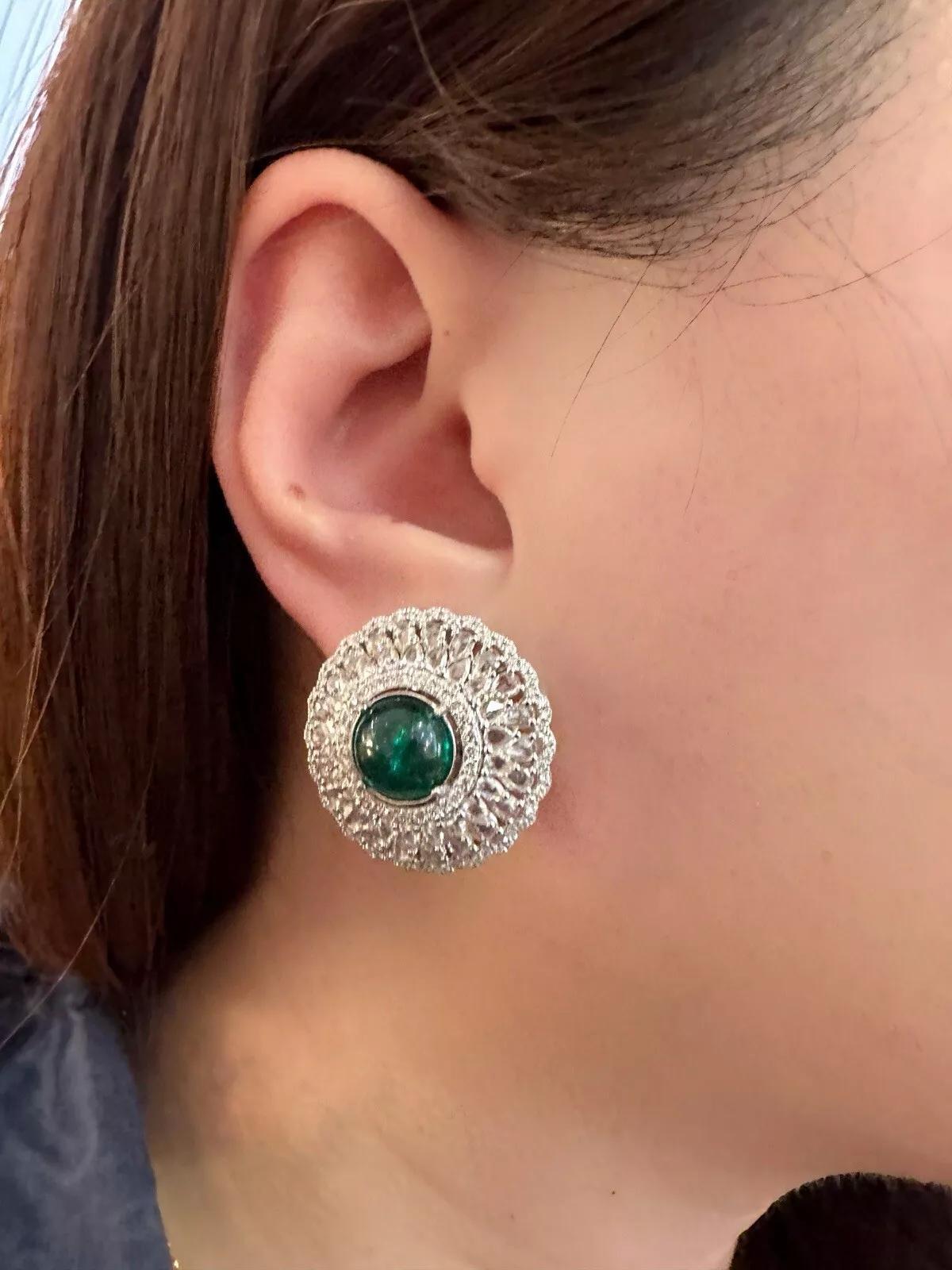 Emerald Cabochon and Rose cut Diamond Ring in 18k White Gold 

Emerald and Diamond Earrings features 2 Natural Round Emerald Cabochons weighing 8.07 carats surrounded by Round Brilliant Diamonds and Pear shape Rose Cut Diamonds weighing 5.90 carats