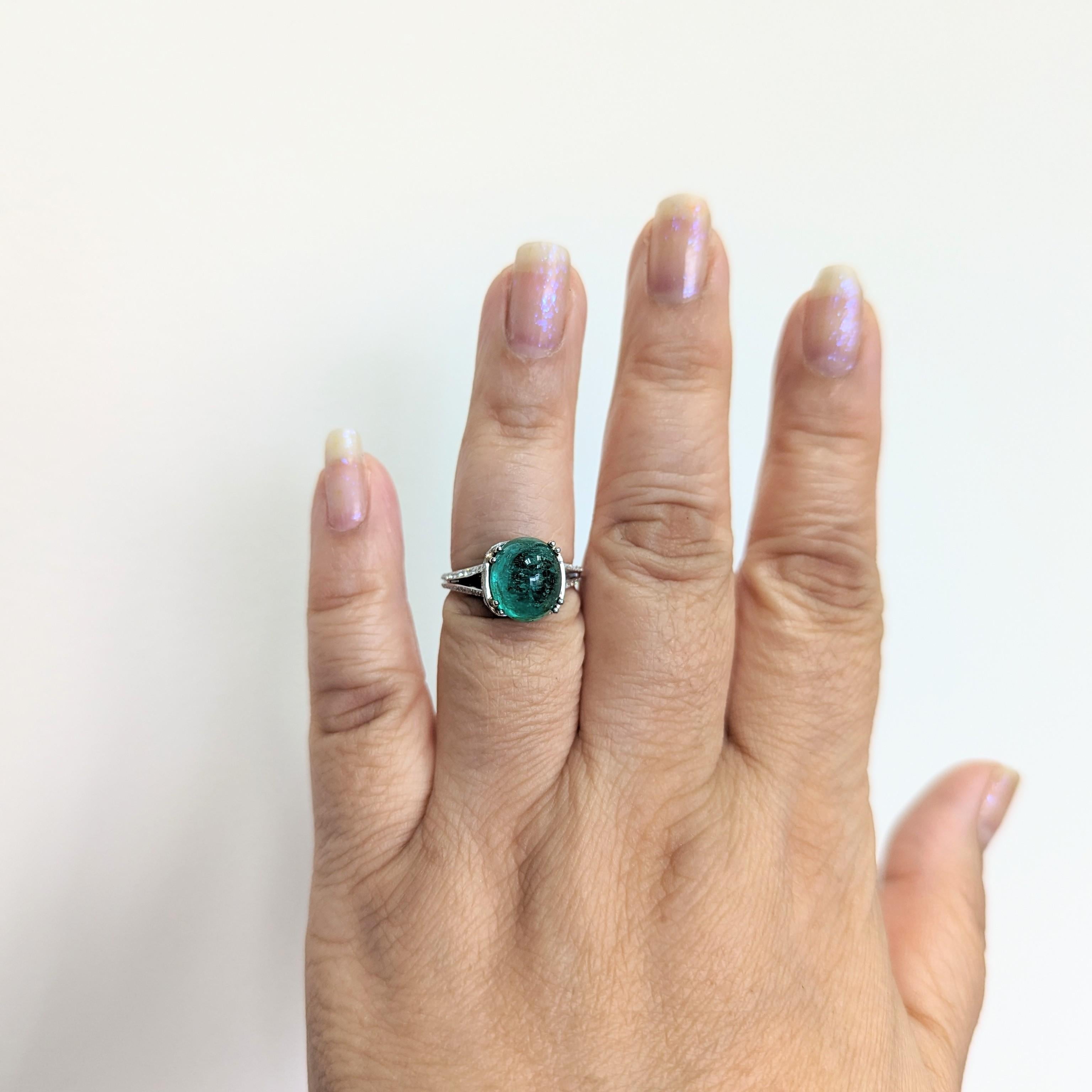 Beautiful 5.95 ct. emerald cabochon and 0.15 ct. white diamond round cocktail ring.  Handmade in platinum.  Ring size 6.5.