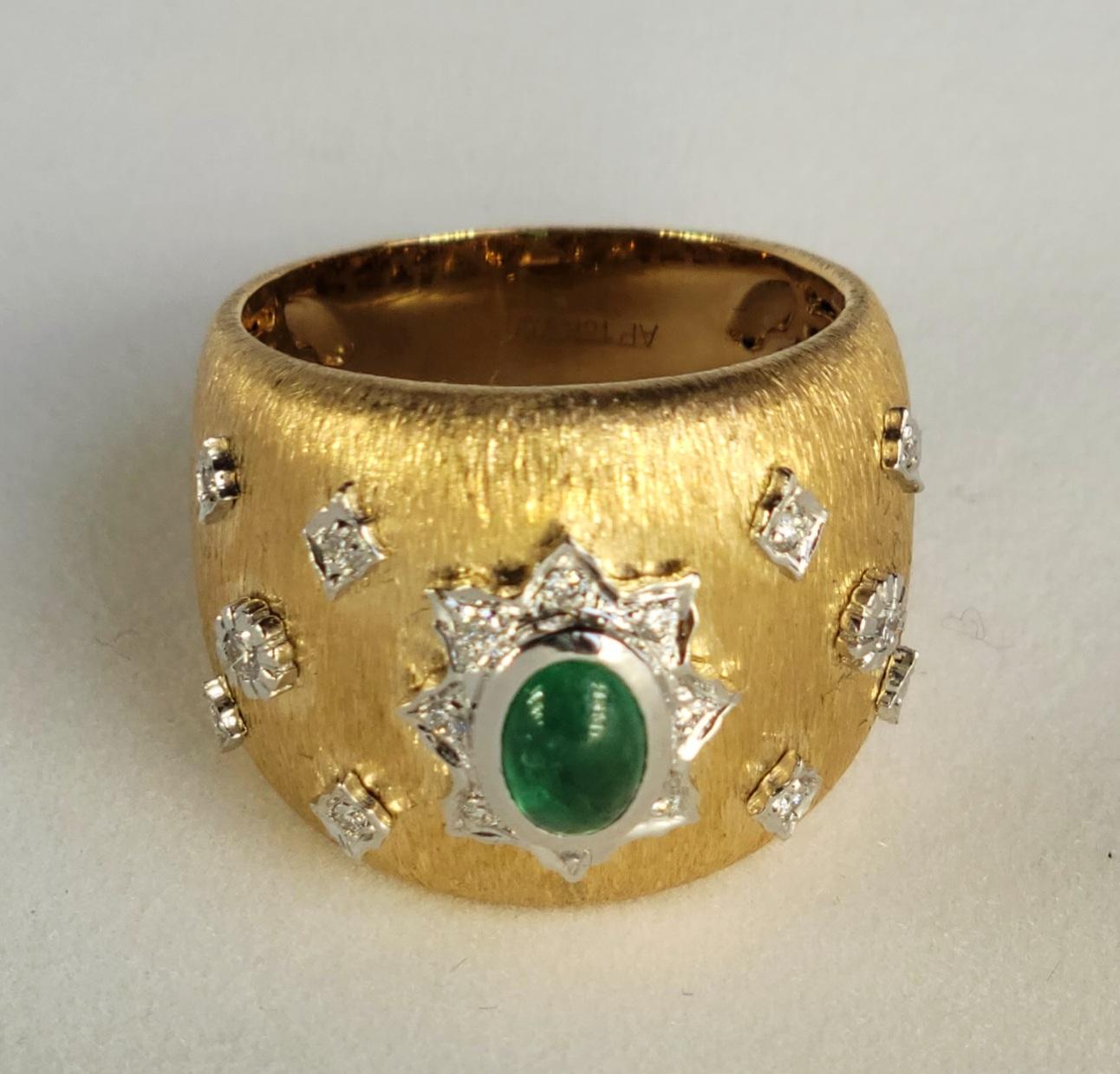 EMERALD Cocktail Ring with Diamonds in Florentine Finish inspired by Buccellati
1 EMERALD - 0.50cts 
18 ROUND DIAMONDS - 0.14cts
18K WHITE AND YELLOW GOLD - 11.86gm
SIZE - US 6.5 

This unique piece is made using the Florentine exquisite technique