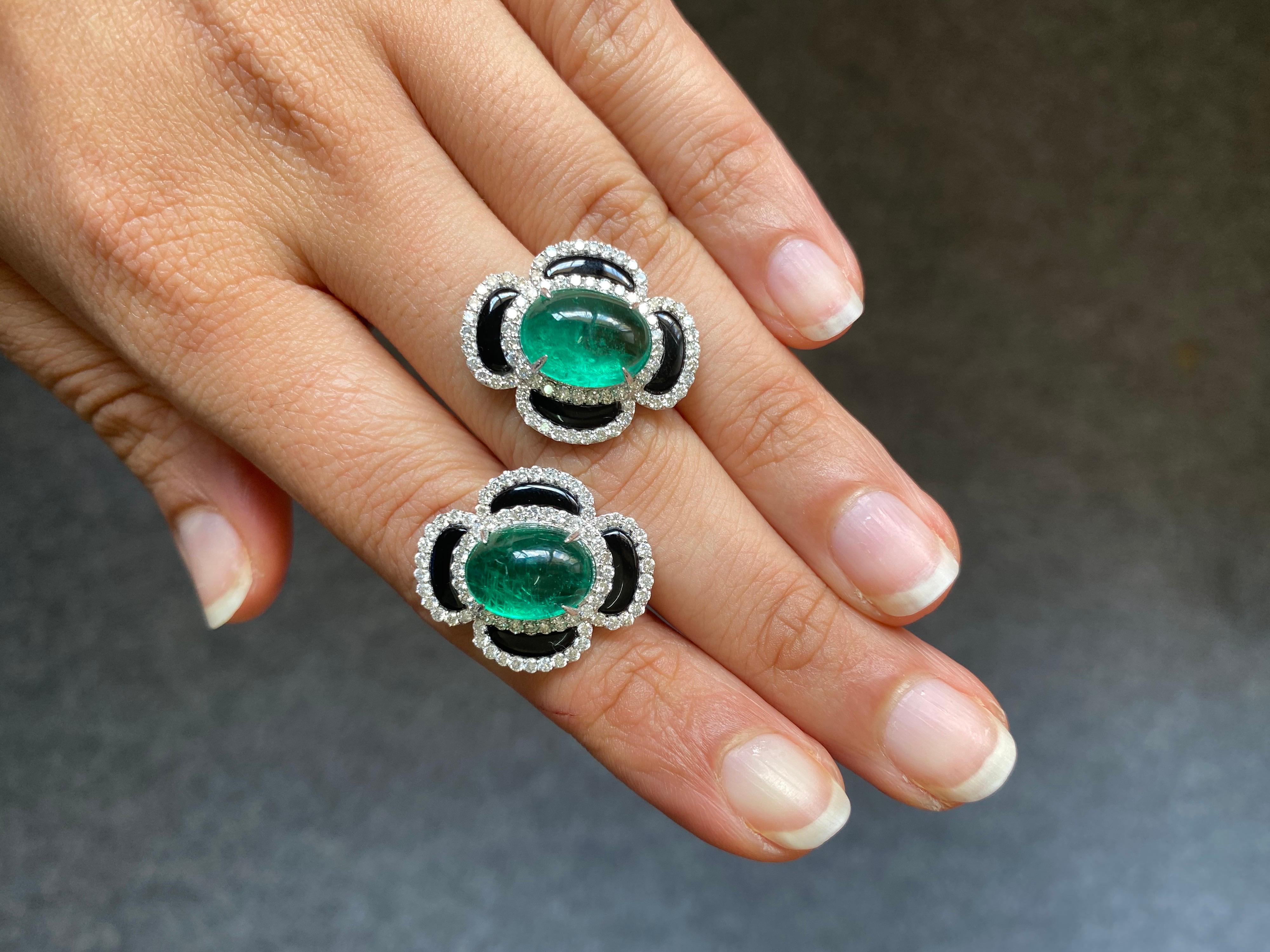 A pair of natural Zambian Emerald Cabochon (weighing 8.97 carats in total) stud Earrings, of very high quality and great luster and color. The stones are set in 7.5 grams of solid 18K White Gold and 1.7 carats White Diamonds. 
There is a matching