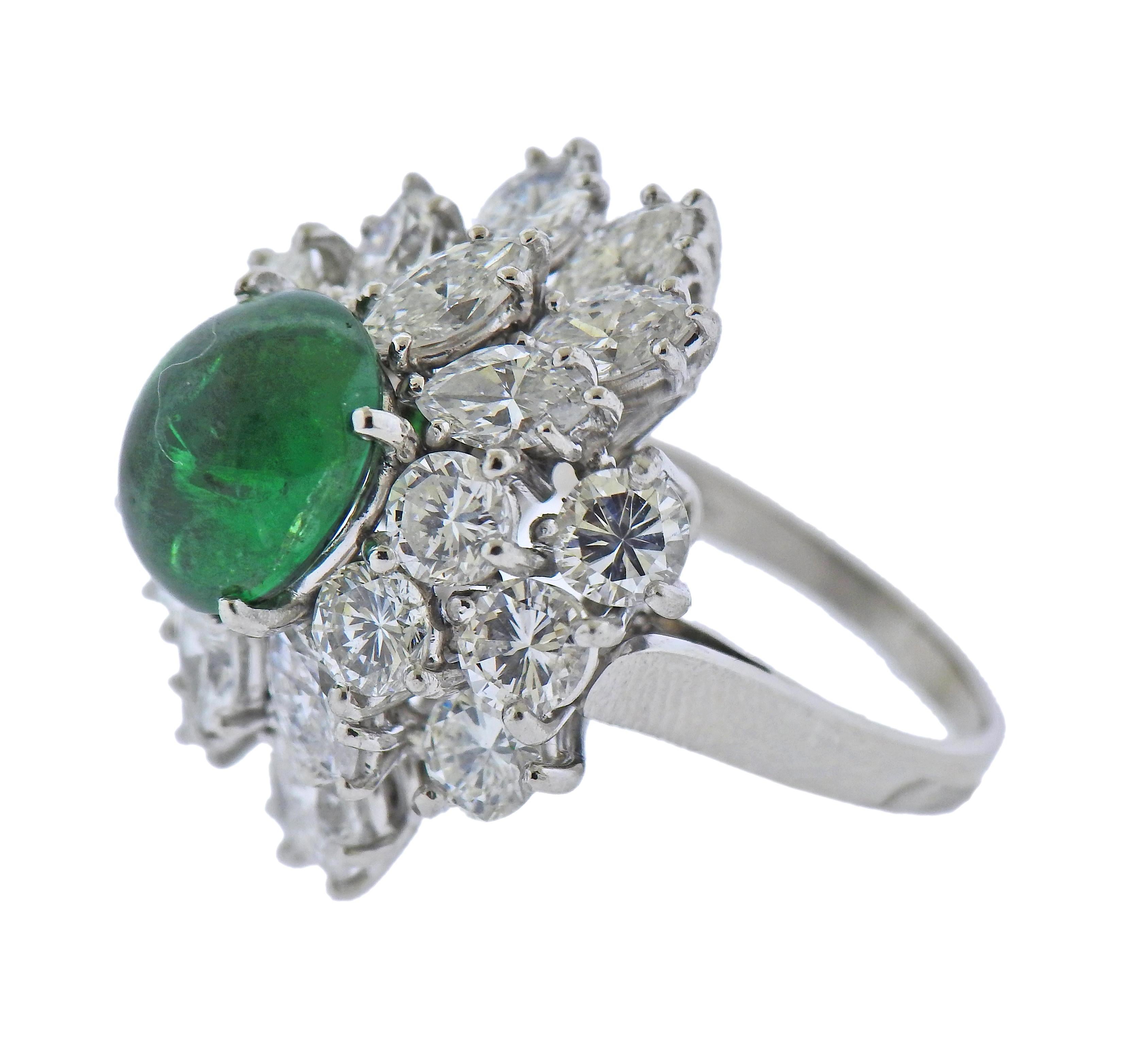 Platinum cocktail ring, set with emerald cabochon - 10.2 x 8.9mm, surrounded with approx. 6.00ctw in marquise and round diamonds. Ring size - 4.5, ring top - 24mm x 21mm. Marked: Plat. Weight - 13.9 grams.