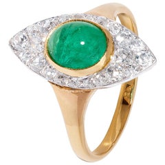 1.17 Carats Emerald Cabochon Ring with Retro-Style Diamond Cluster