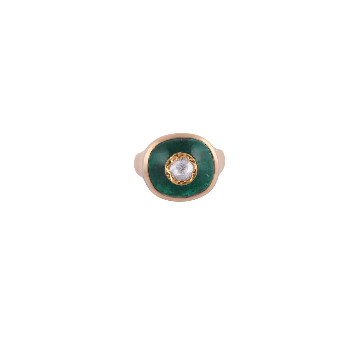 A one of a kind, cabochon Zambian Emerald weighing (13.01 carats) with Inlaid
(O.30 Carat) Diamond on Top .All set in(6.99 Gram) 18K solid Yellow gold with Matt Finish. The center stone Emerald is Inlaid with Diamond  & Emerald is of fine green