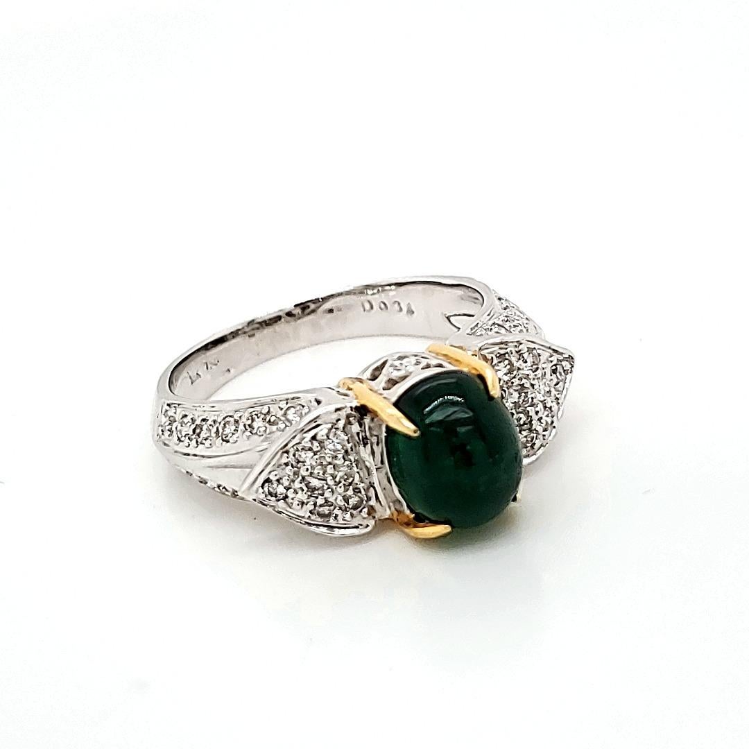 Contemporary Emerald Cabochone Engagement ring with diamond studded gold planks.  For Sale