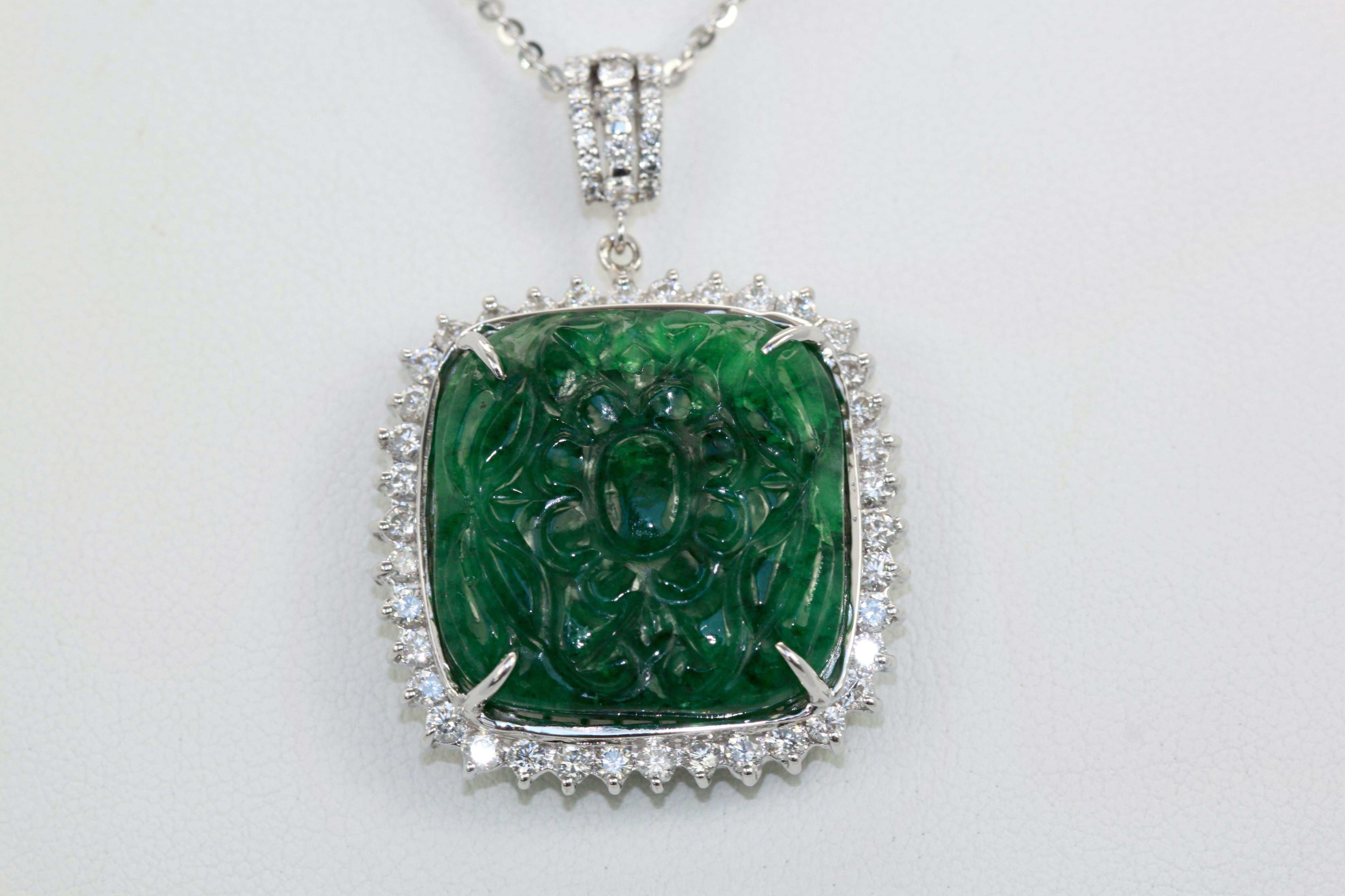 Emerald Cut Emerald Carved Pendant Set in Diamond Surround 18K