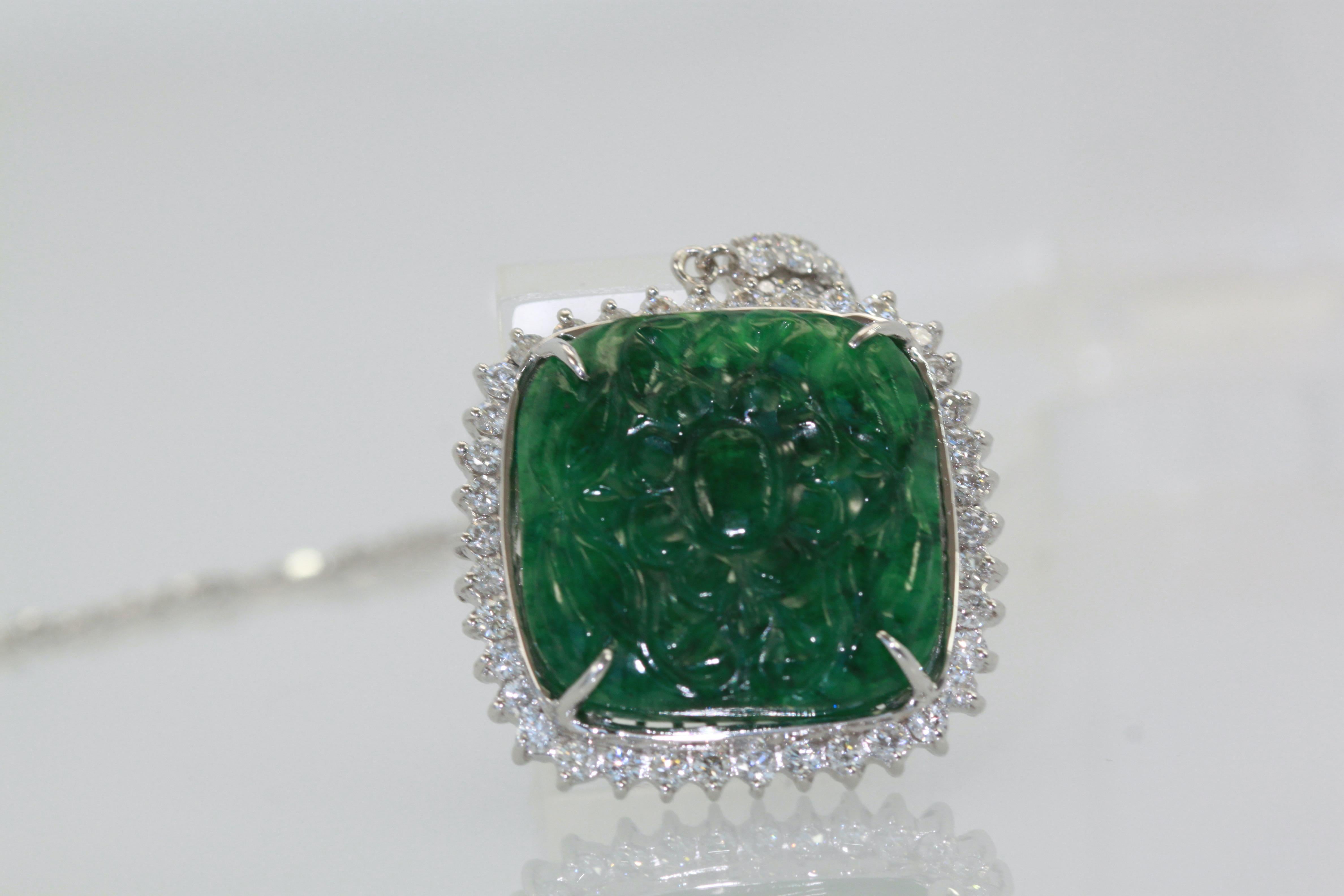 Women's Emerald Carved Pendant Set in Diamond Surround 18K