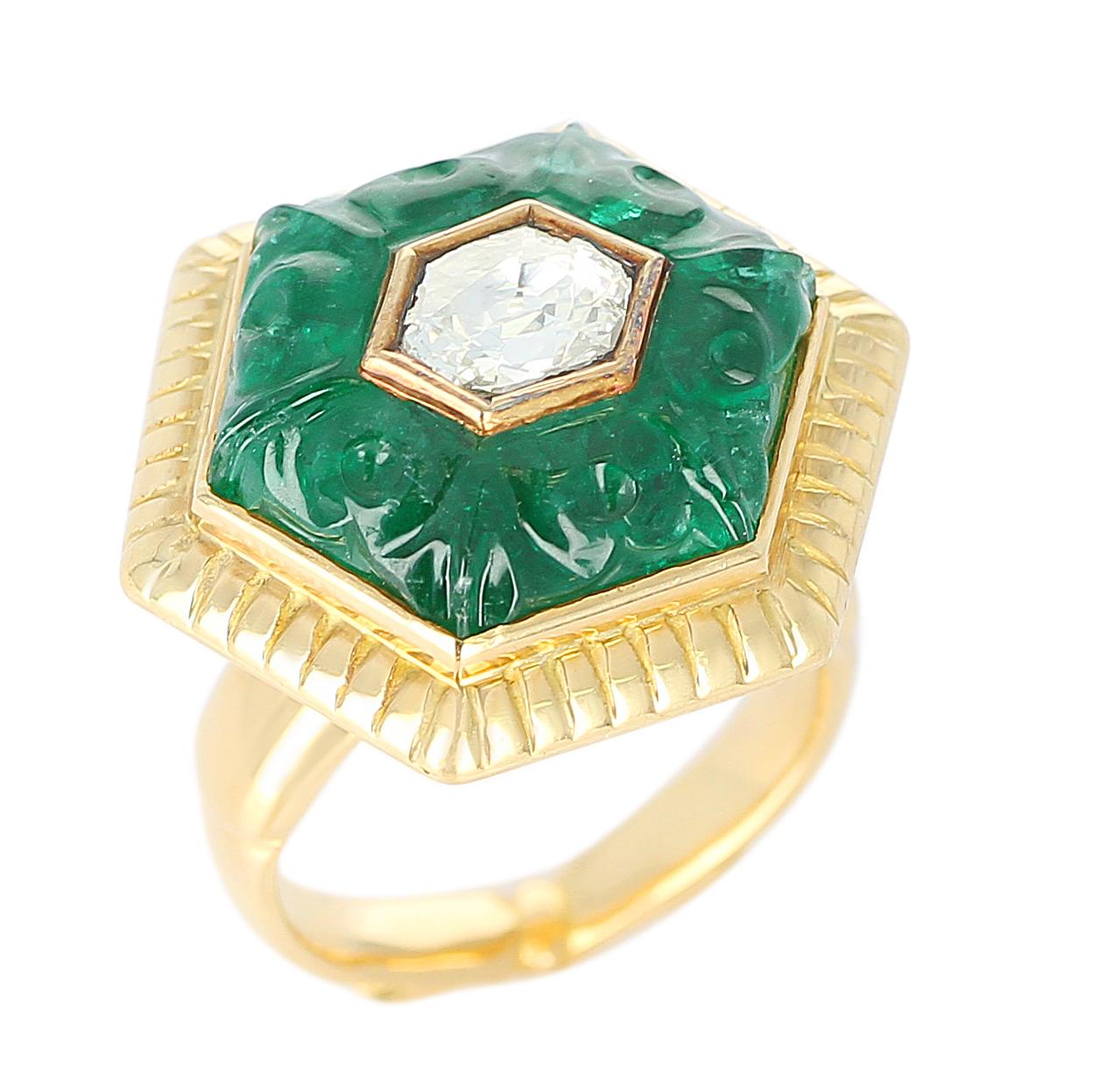 An Emerald Carving Ring with a Diamond Rose Cut in the middle, in 22 Karat Yellow Gold. Diamond Weight: 0.75 carats, Total Weight: 18.08 grams, Ring Size US 5.75.