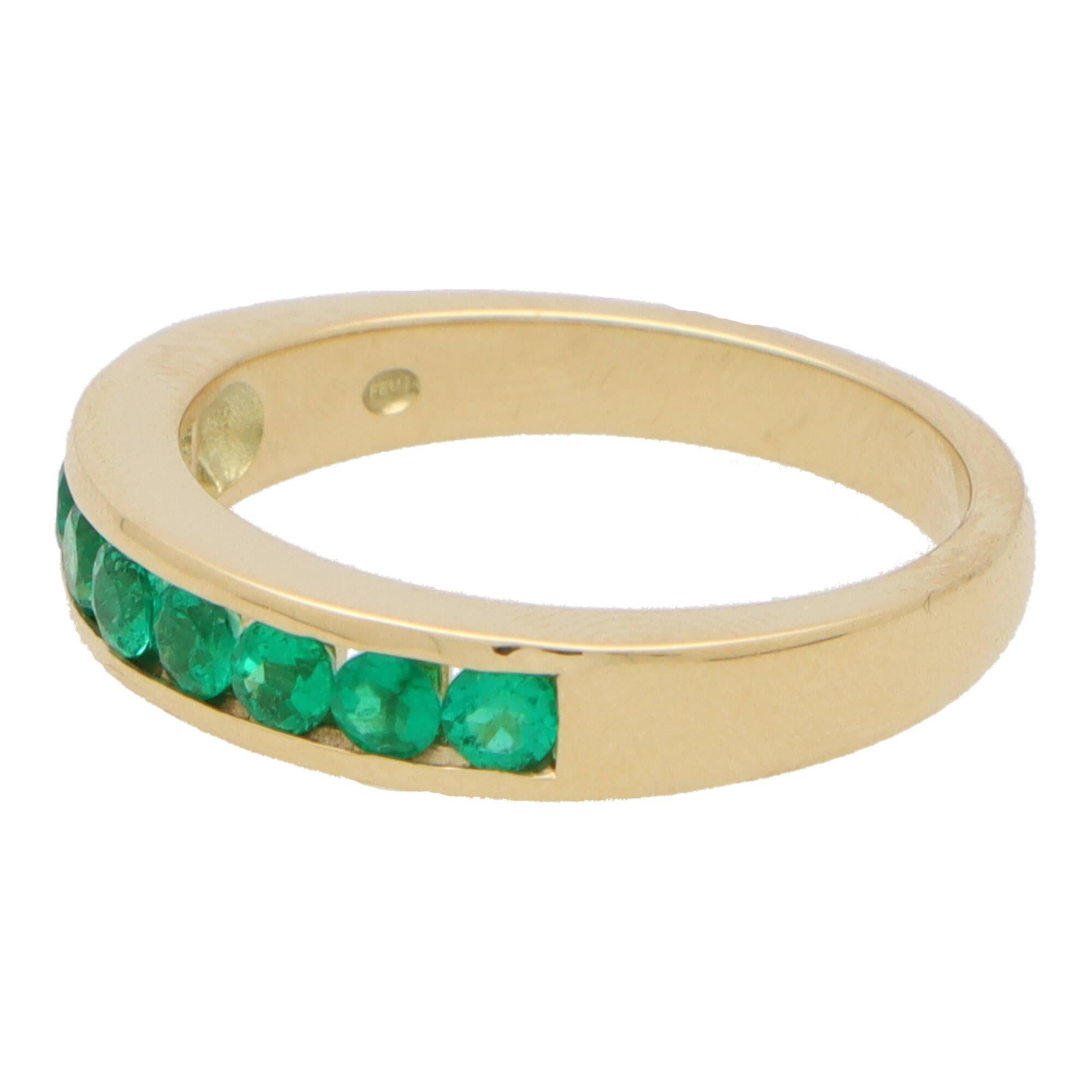Modern Emerald Channel Set Half Eternity Ring in 18k Yellow Gold For Sale