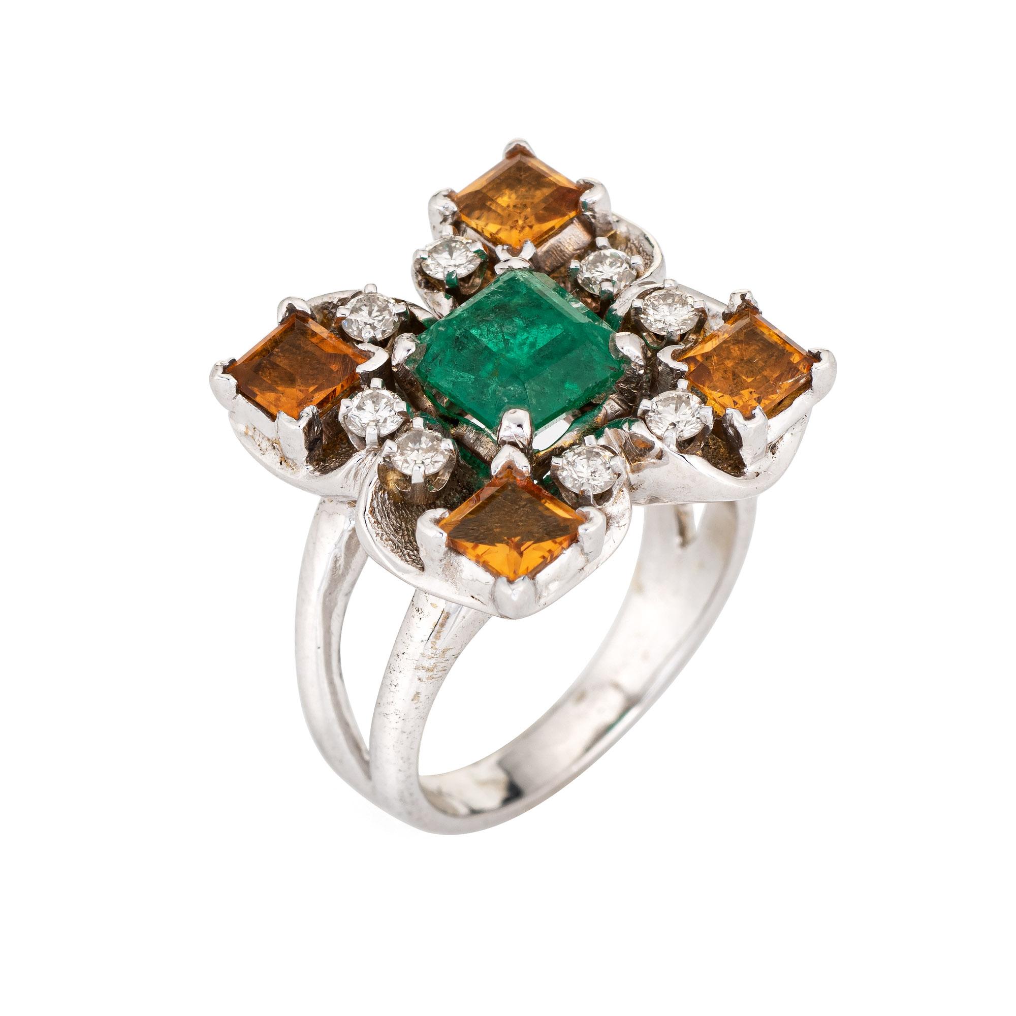 Finely detailed vintage emerald, citrine & diamond square cocktail ring (circa 1960s to 1970s), crafted in 14 karat white gold.

Emerald measures 7mm; four citrines measure 4.5mm each and eight diamonds total an estimated 0.16 carats (estimated at