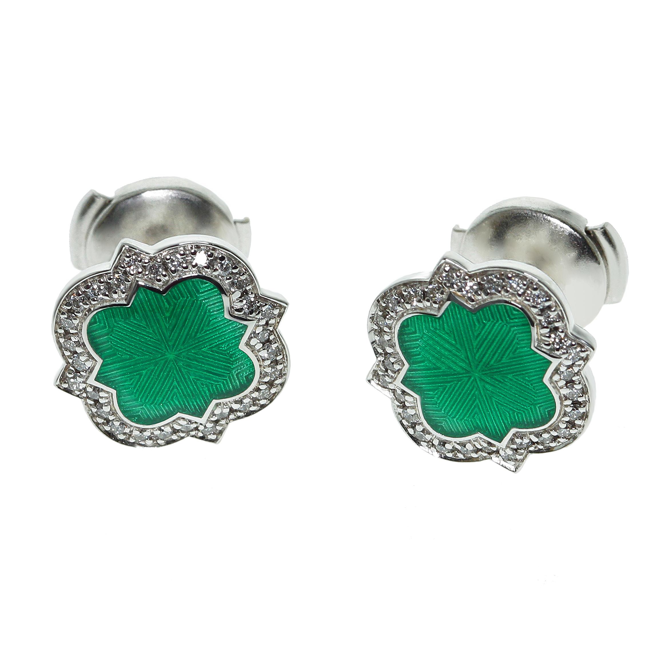 Emerald Color Enamel Diamond 18 Karat White Gold Stud Earring

This small and accurate earrings are the company to our Emerald ring LU116414762721.
Enamel is the same color tone as the central stone in Ring.

10x10x3 mm
3.94 gm