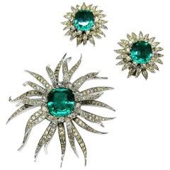 Retro Emerald cushion cut and clear paste 'sunburst' brooch and earrings, Jomaz, 1960s