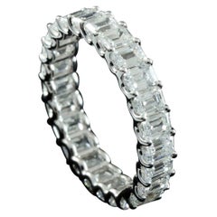 Emerald Cut 0.15 Carat Each Diamond Eternity Ring in 18 Karat Gold