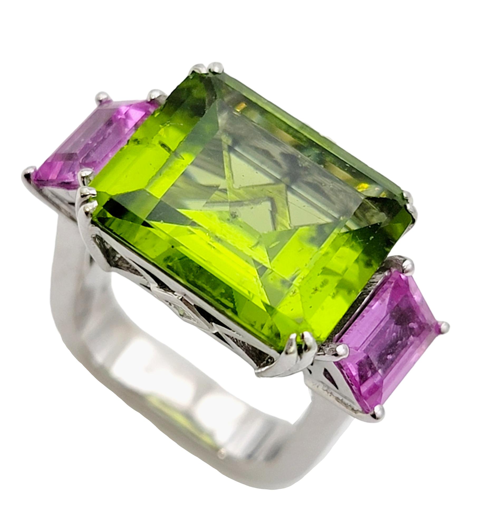 Women's Emerald Cut 11.42 Carat Peridot, Pink Sapphire and Diamond Euro Shank Band Ring For Sale