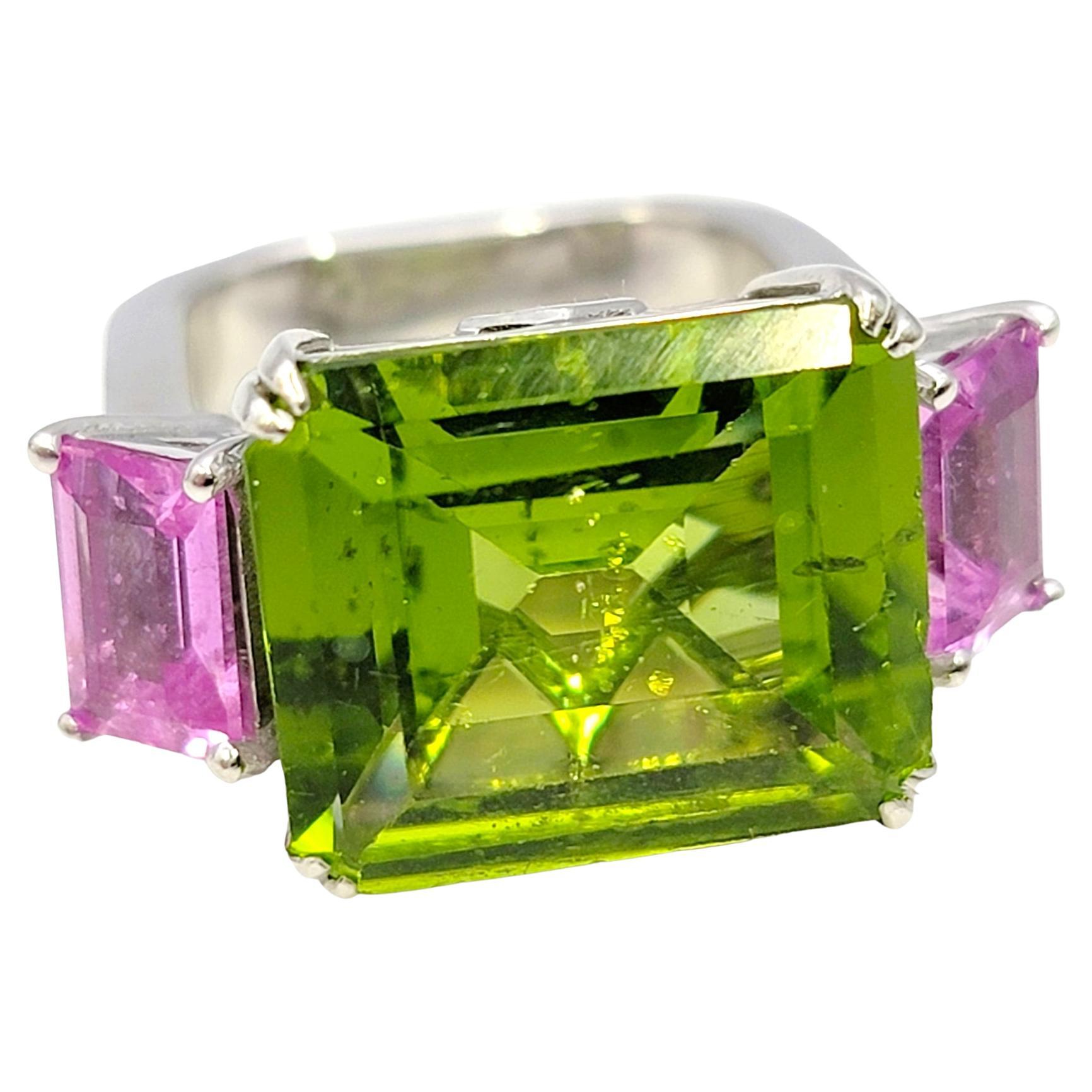 Emerald Cut 11.42 Carat Peridot, Pink Sapphire and Diamond Euro Shank Band Ring For Sale