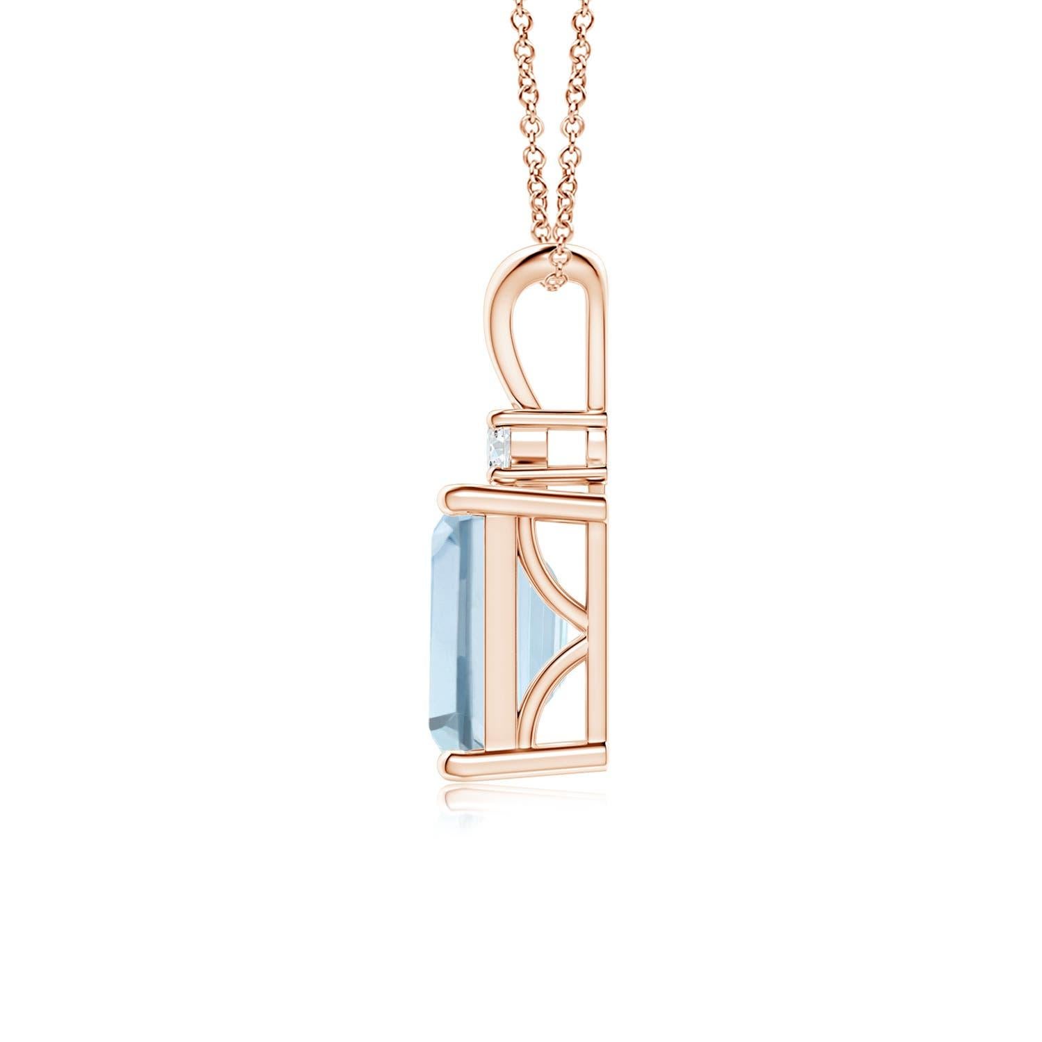 A bold emerald-cut aquamarine framed in a prong setting evokes the beauty of the sky. The diamond accent shines brilliantly along with the azure blue gemstone. A V-bale pendant crafted in 18k rose gold to make a sophisticated style statement. Choose