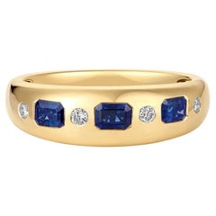 Anello a fascia con diamante e zaffiro blu in oro giallo 14 carati (18 carati su richiesta) con taglio smeraldo