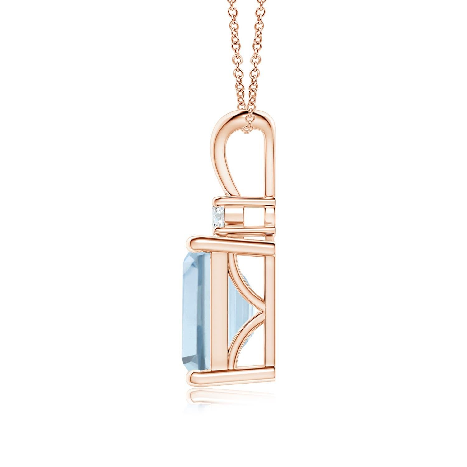 A bold emerald-cut aquamarine framed in a prong setting evokes the beauty of the sky. The diamond accent shines brilliantly along with the azure blue gemstone. A V-bale pendant crafted in 14k rose gold to make a sophisticated style statement. Choose