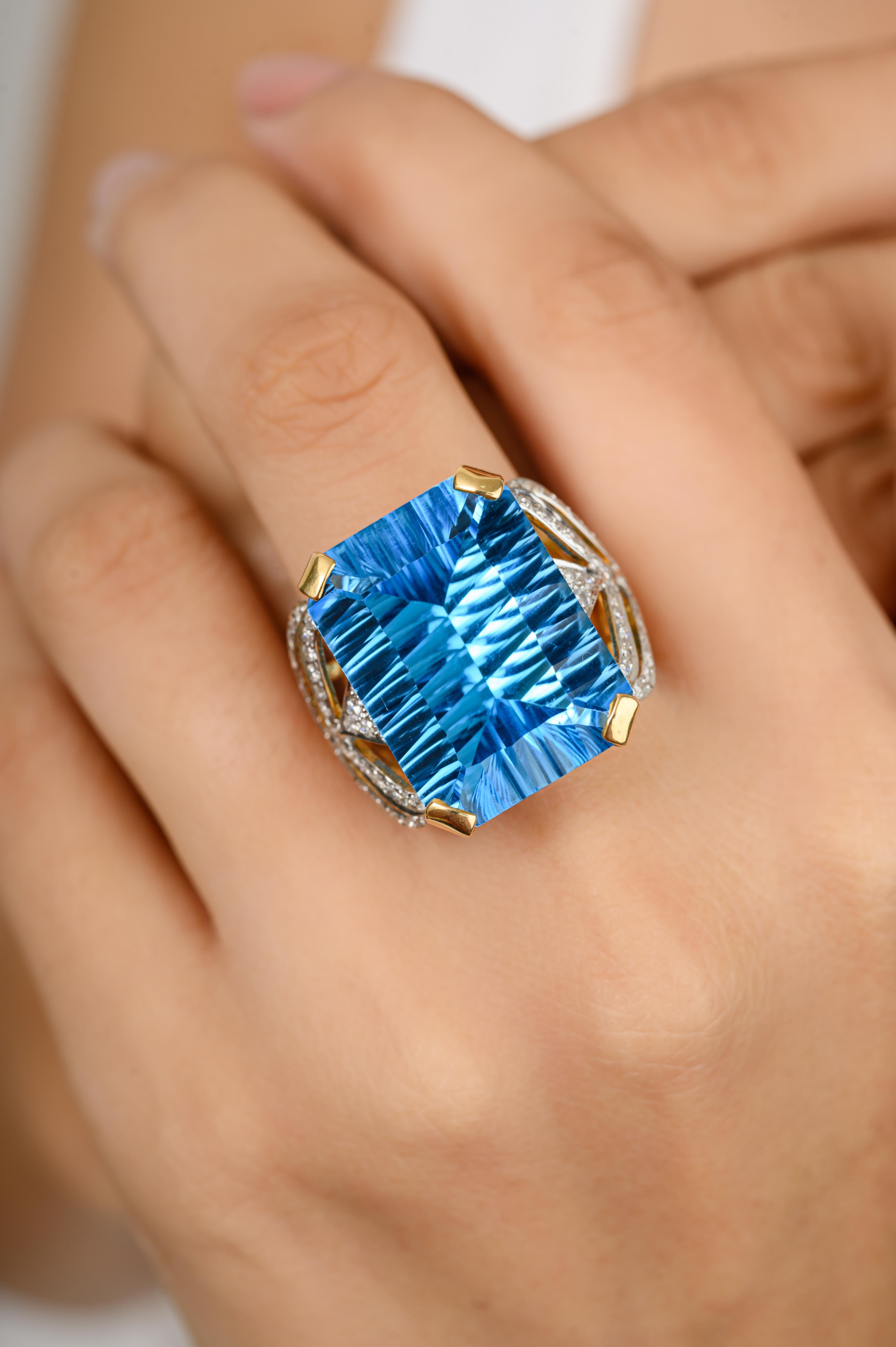 En vente :  Bague cocktail en or jaune 18 carats exclusive avec topaze bleue taille émeraude 23,45 carats 4
