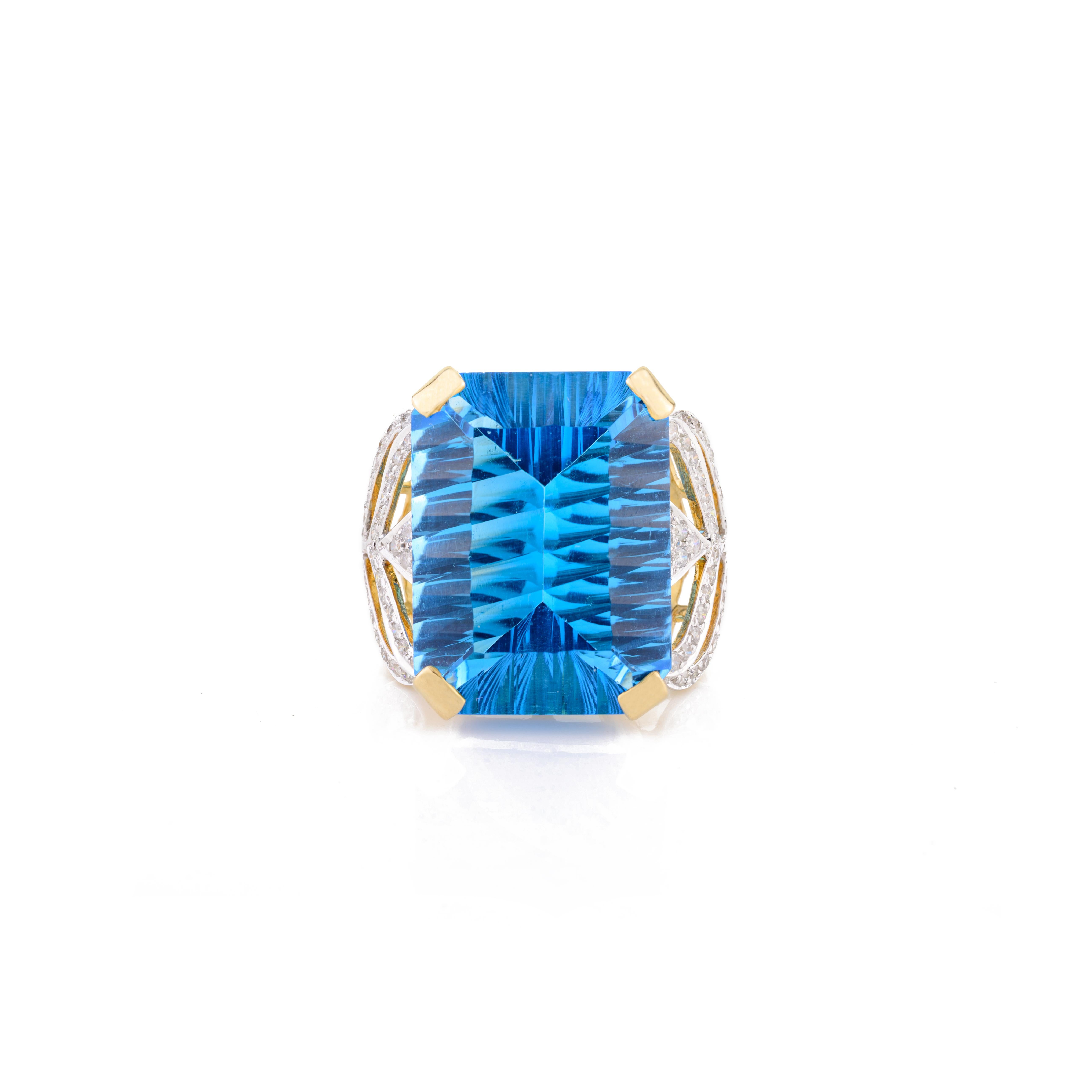 En vente :  Bague cocktail en or jaune 18 carats exclusive avec topaze bleue taille émeraude 23,45 carats 9