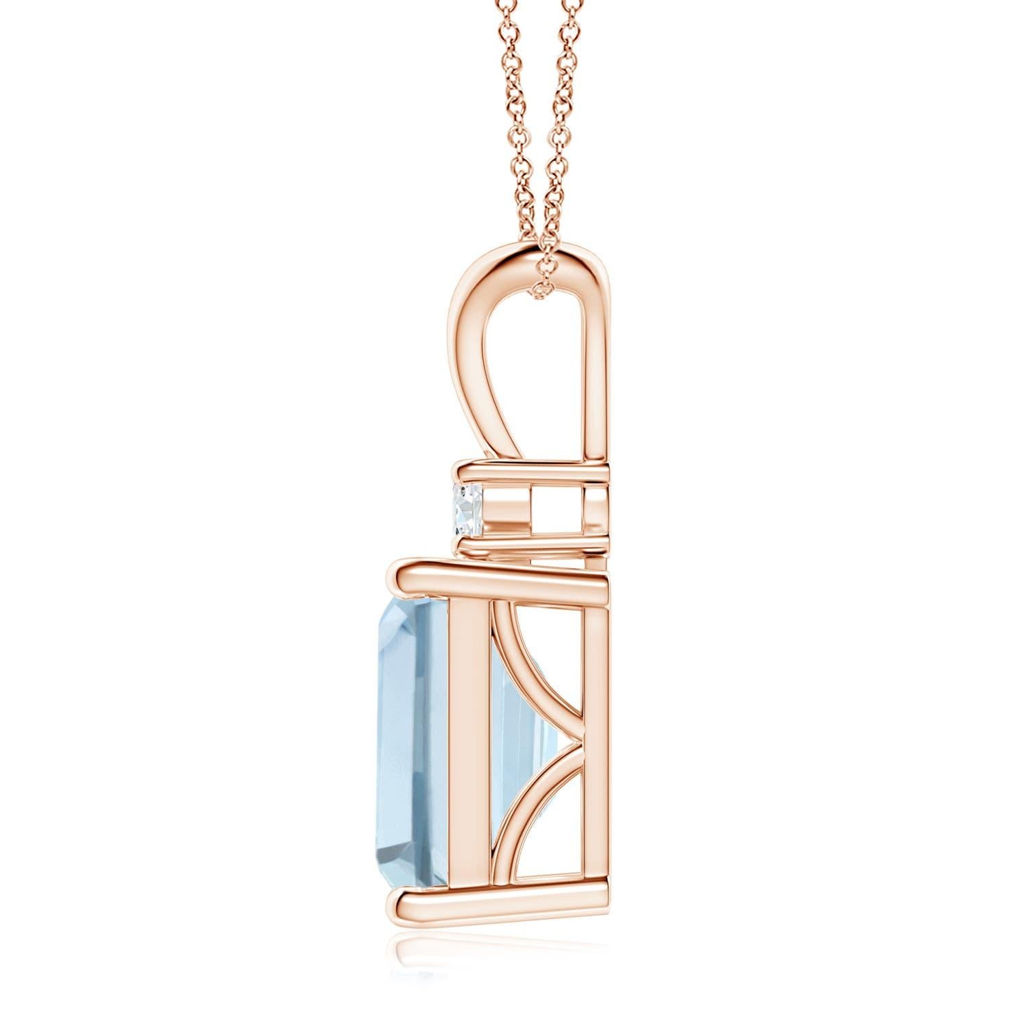 A bold emerald-cut aquamarine framed in a prong setting evokes the beauty of the sky. The diamond accent shines brilliantly along with the azure blue gemstone. A V-bale pendant crafted in 14k rose gold to make a sophisticated style statement. Choose