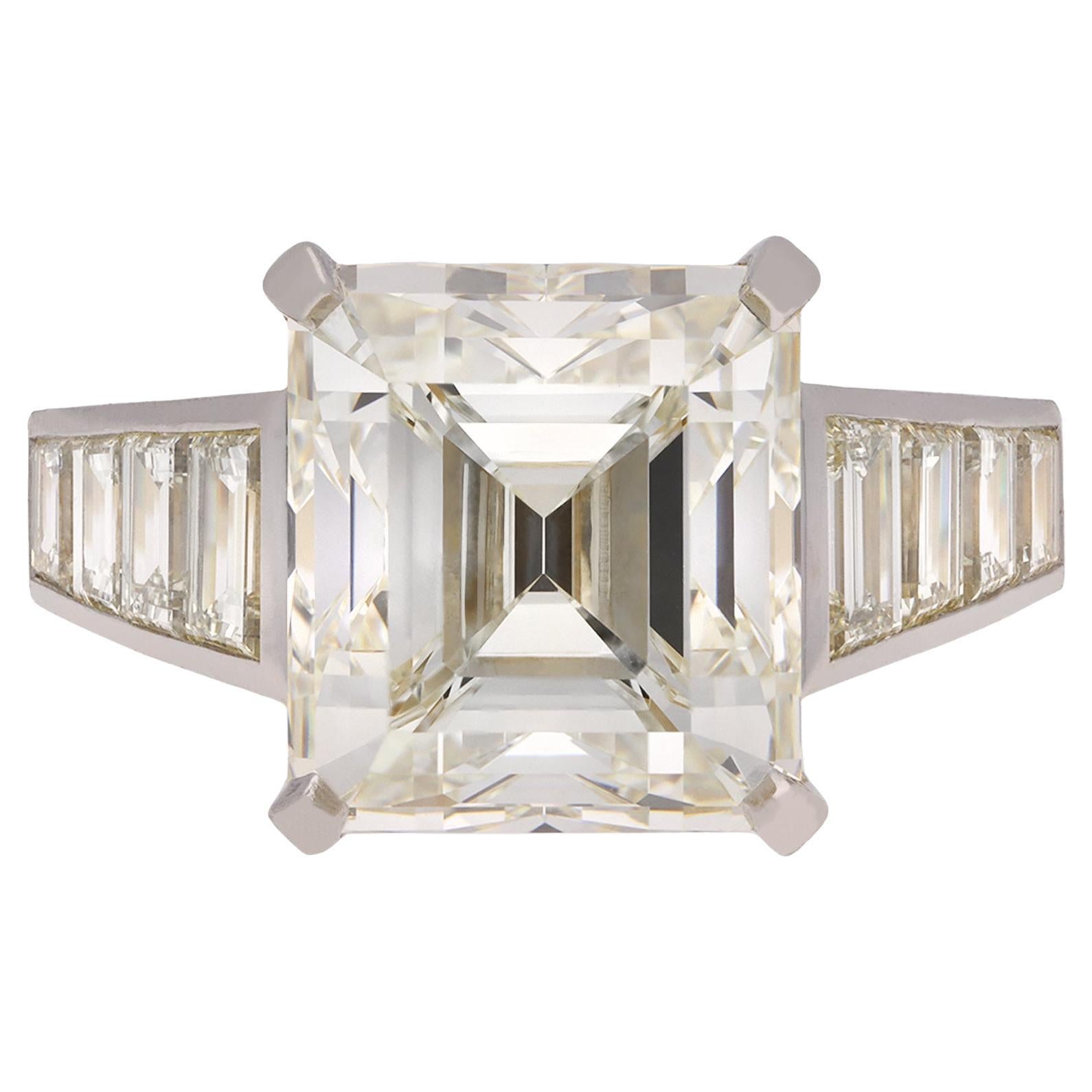 Emerald-Cut 6.95 Carat GIA Diamond Flanked Solitaire Ring, circa 1970 For Sale