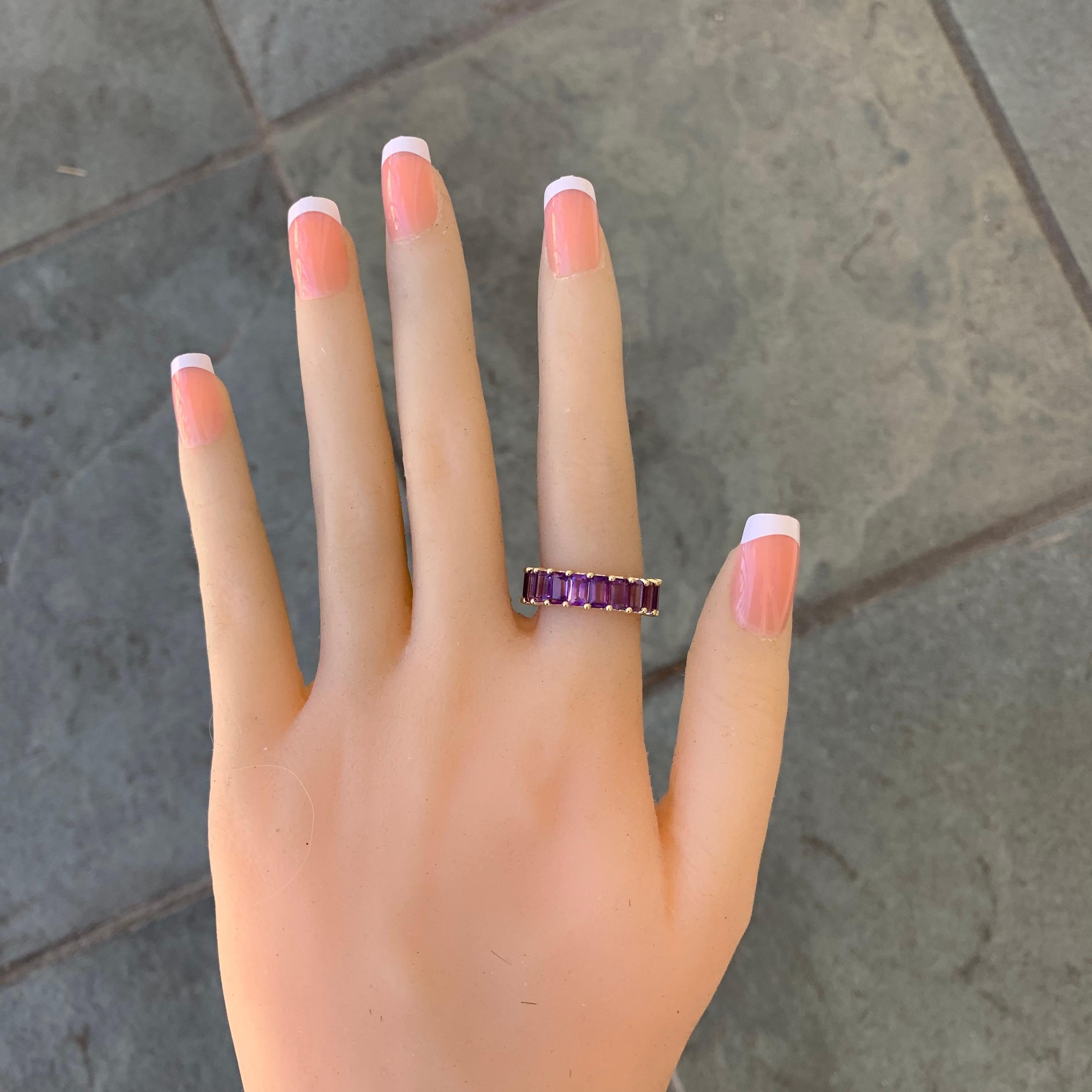 If you would like a different color gemstone we can do that as well just message us.
Emerald Cut Amethyst February Birthstone Eternity Band 

Can be sized to any finger size, this ring will be made to order and take approximately 1-3 weeks from