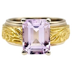 Emerald Cut Amethyst Solitaire Ring with Ornate Engraved Band in 18 Karat Gold