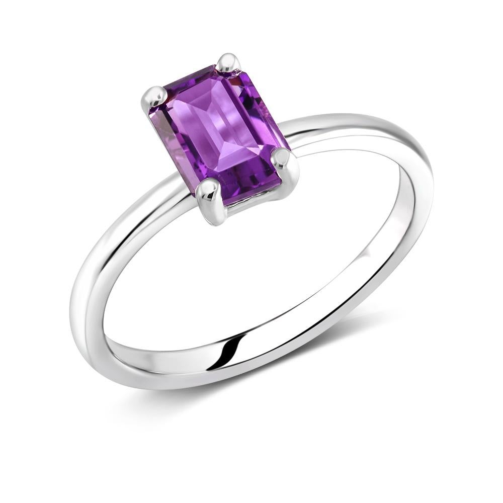Sterling Silver Solitaire Emerald Cut ring 
Amethyst weighing one carat
Blue topaz measuring 7x5 millimeter 
Ring finger size 6
New Ring
The ring can be resized
White gold plated 
Handmade in the USA
