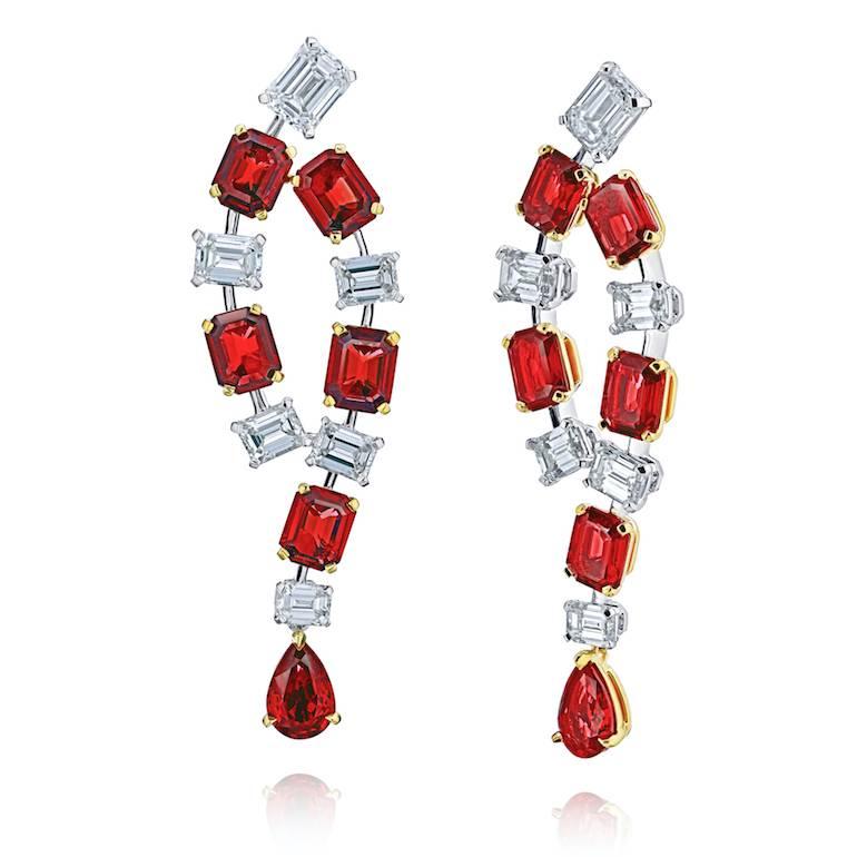 5.67 carats of emerald cut (10) and pear shape (2) red rubies (no heat) with emerald cut diamonds (12) 2.89 carats set in platinum with 18k yellow gold push back drop earrings
