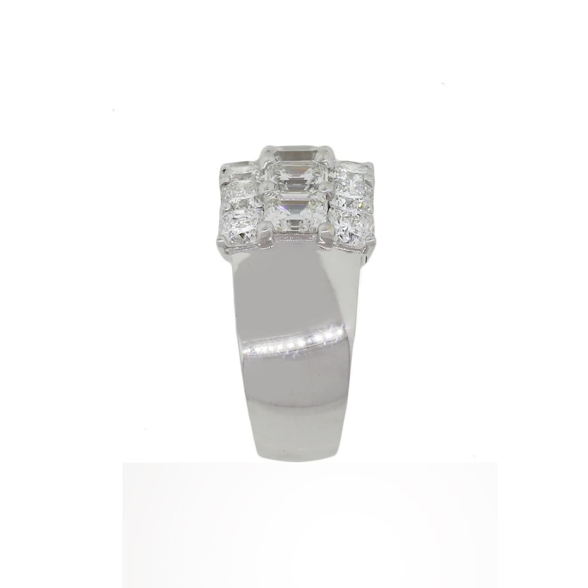 emerald cut and round brilliant diamond ring