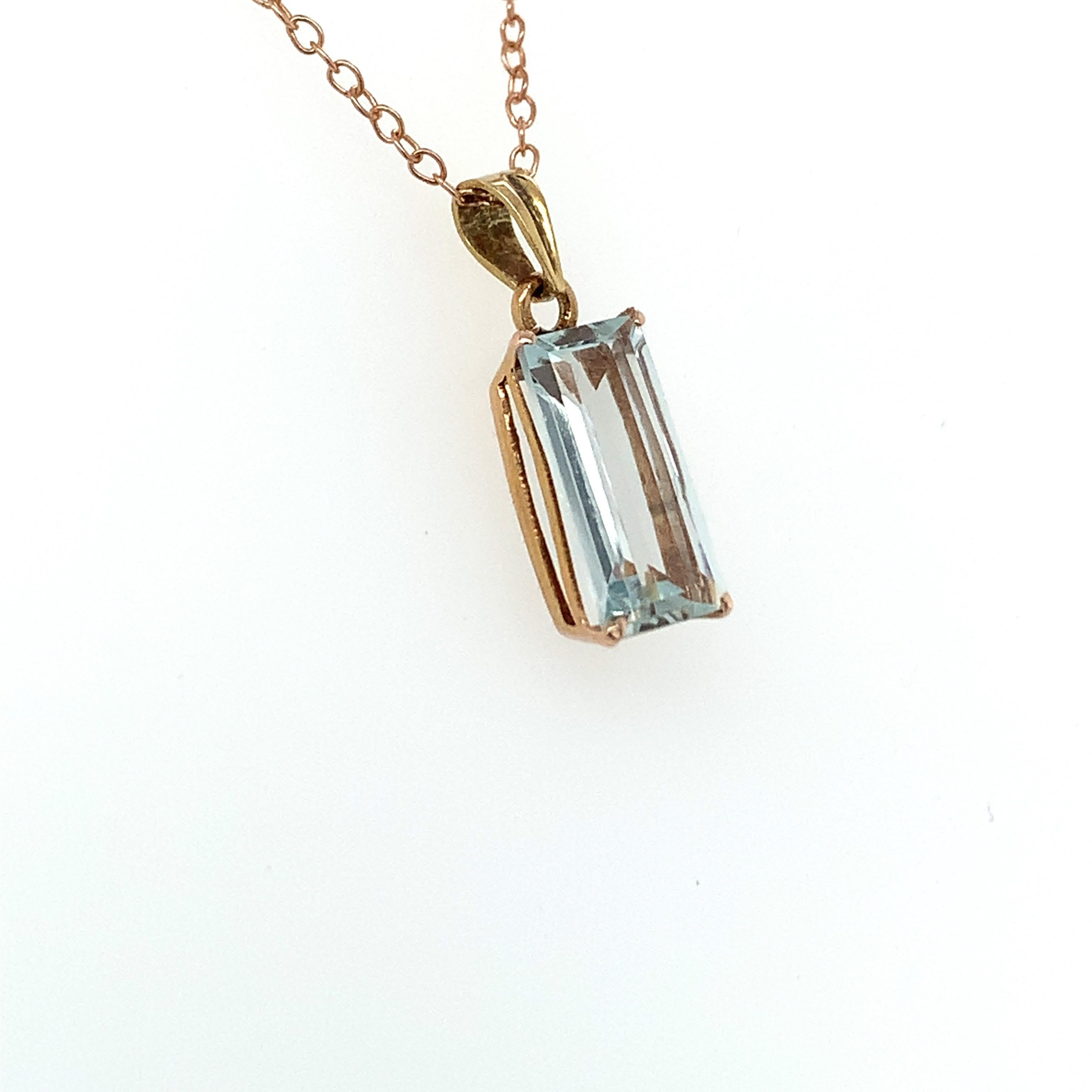 Hand cut and polished natural aquamarine is crafted with hand in 14K yellow gold. 
Ideal for daily casual wear.
Chain is not included. 
Image is enlarged to get a closer view.
Ethically sourced natural gem stone.