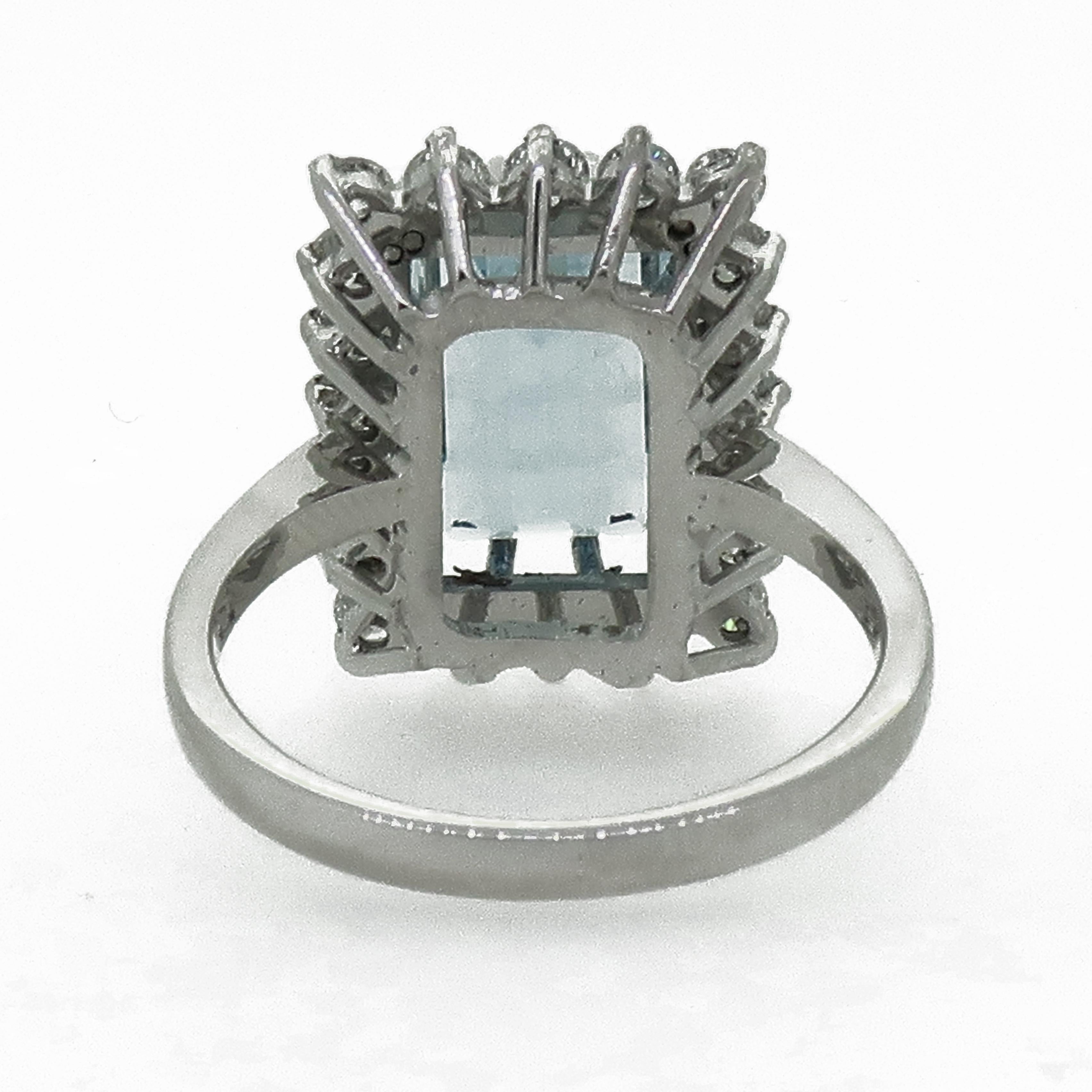 Contemporary Emerald Cut Aquamarine and Diamond Claw Set Cluster Ring 18 Karat White Gold