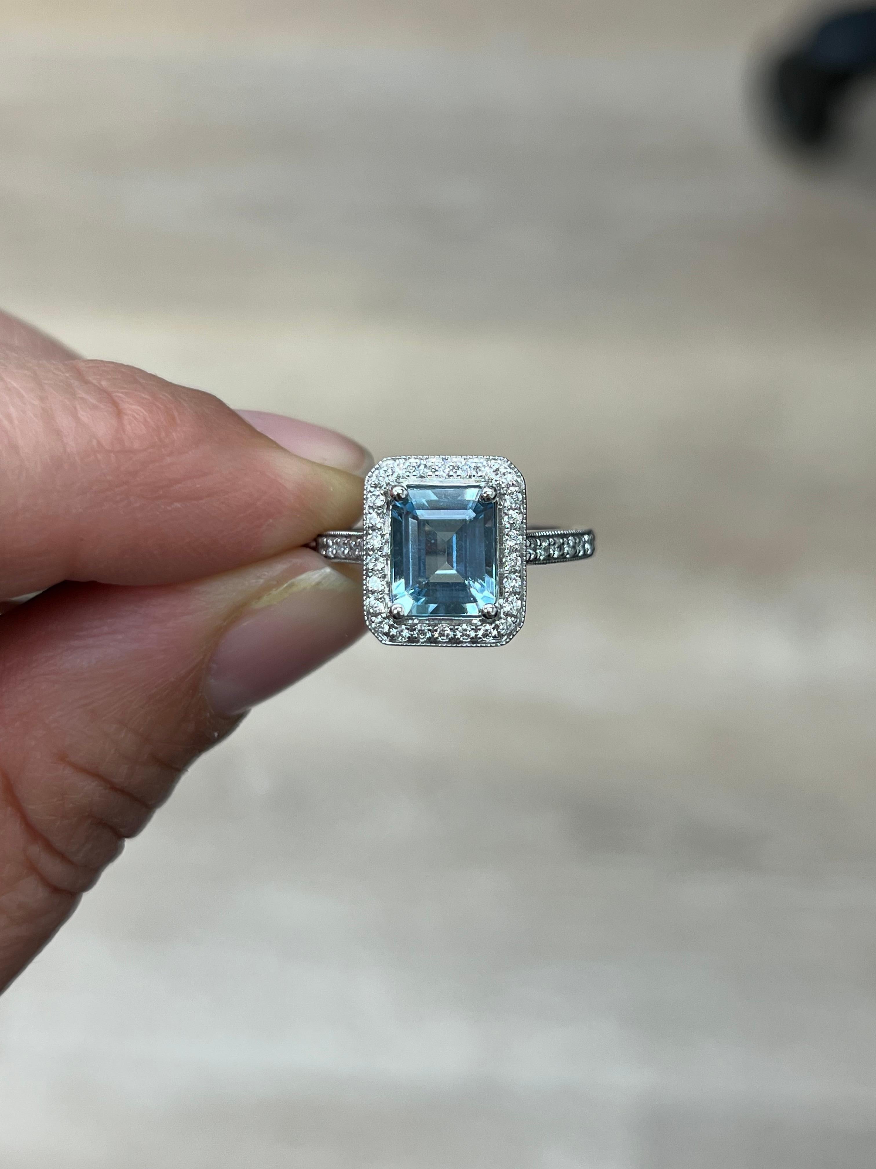 14K white gold diamond and aquamarine ring

Features
14K white gold
1.88 carat aquamarine measure 8x7 mm
.44 carat total weight in diamonds
The top of the ring measures 13x11 mm.
The ring band measures 2mm width
Ring size 7 
