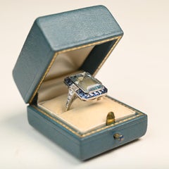 Platinum Aquamarine and Sapphire Halo Ring. 7.40ct Aquamarine with Diamond Ring